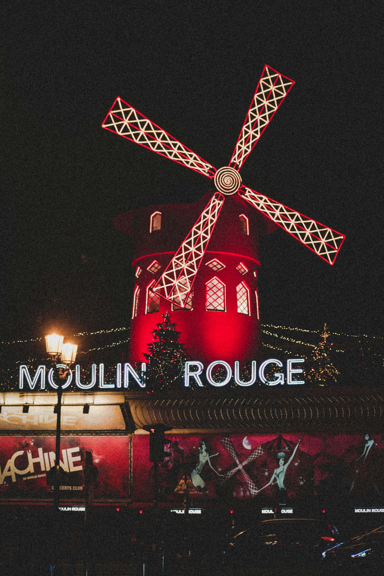 Aspasde Neón De Un Molino De Viento De Moulin Rouge. Fondo de pantalla
