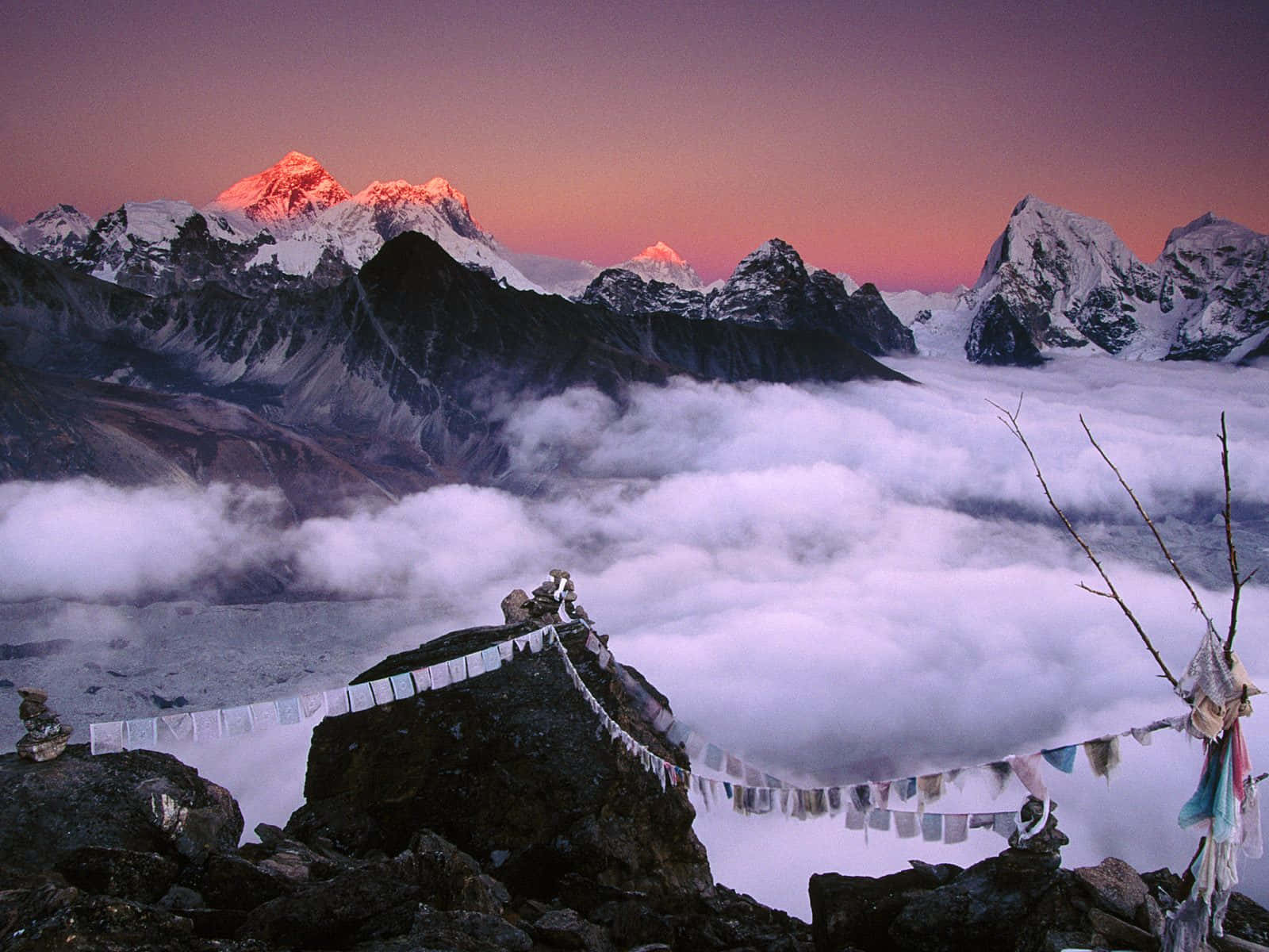 Towering over the Himalayas, Mount Everest stands tall
