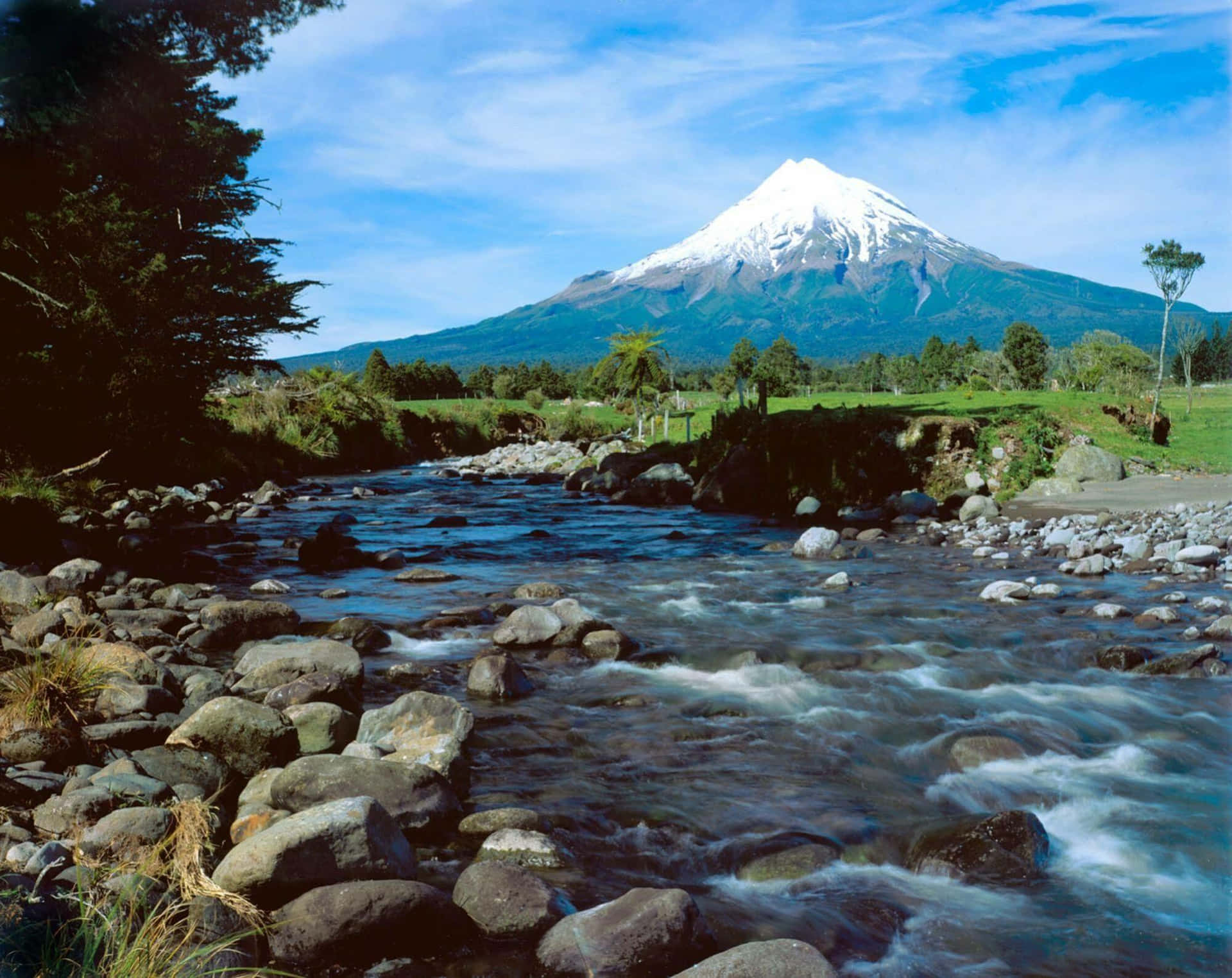 Download Mount Taranaki Over River New Plymouth Wallpaper | Wallpapers.com