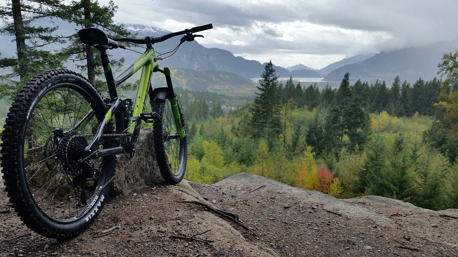 Mountain Bike Overlooking Scenic Valley.jpg Wallpaper