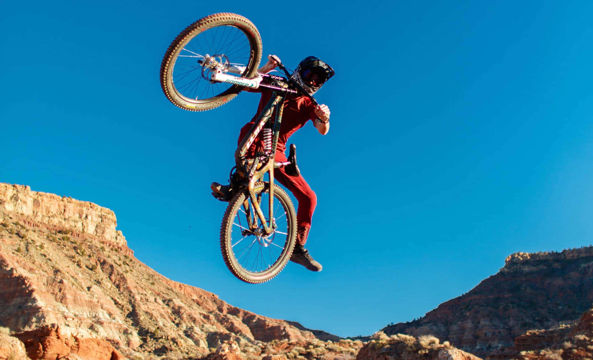 Mountain Biker Mid Air Trick Wallpaper