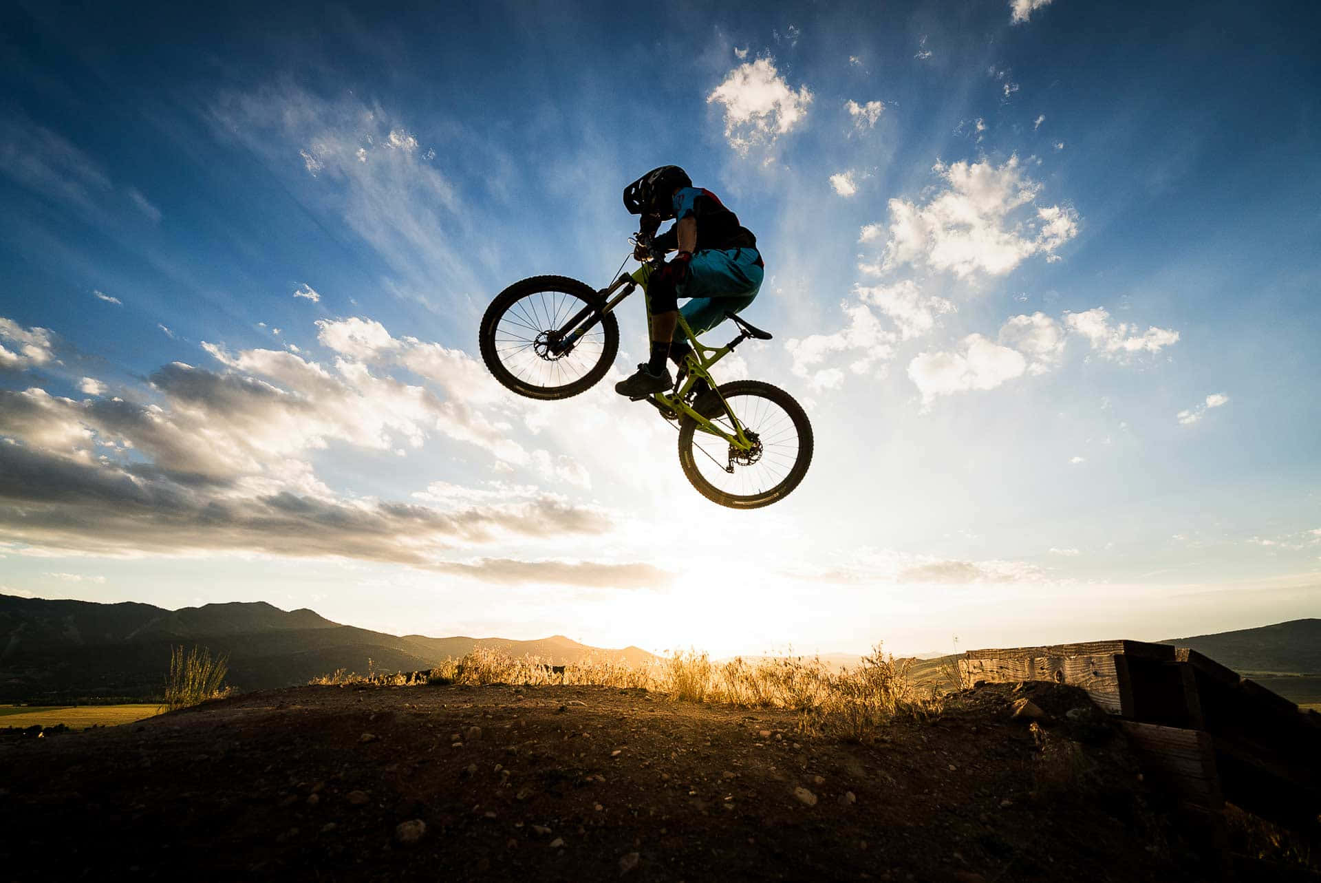 Mountain Biker Sunset Jump Wallpaper