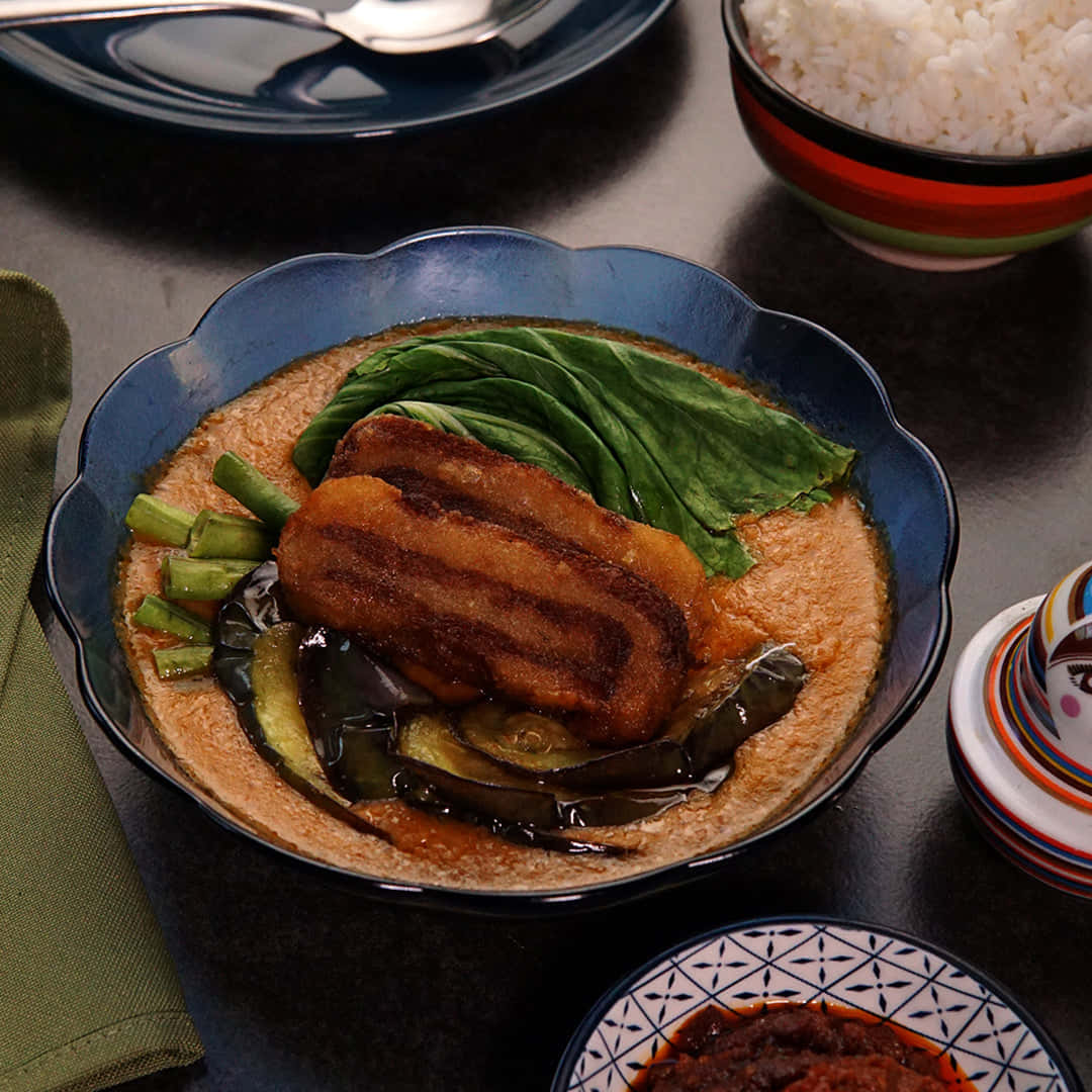 Mouth-watering Kare-kare Topped With Deep-fried Pork Wallpaper