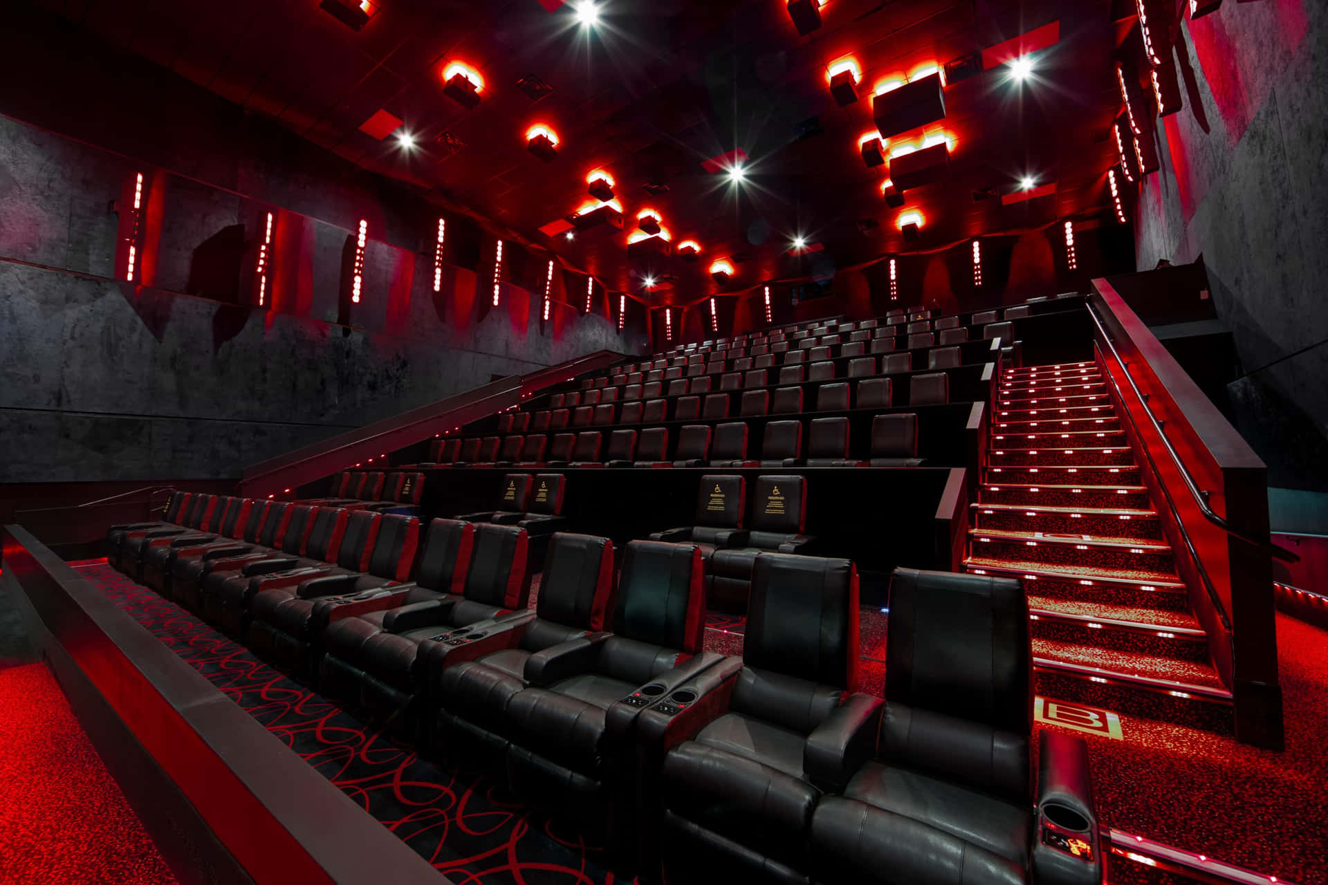 Enjoy the ultimate cinematic experience at the movie theater Wallpaper