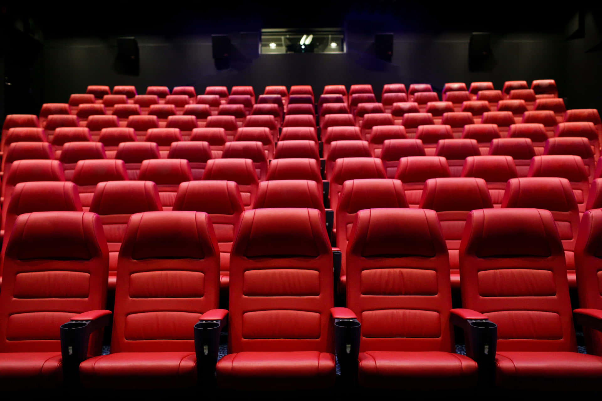 Movie Theater With Red Premium Leather Seats Wallpaper