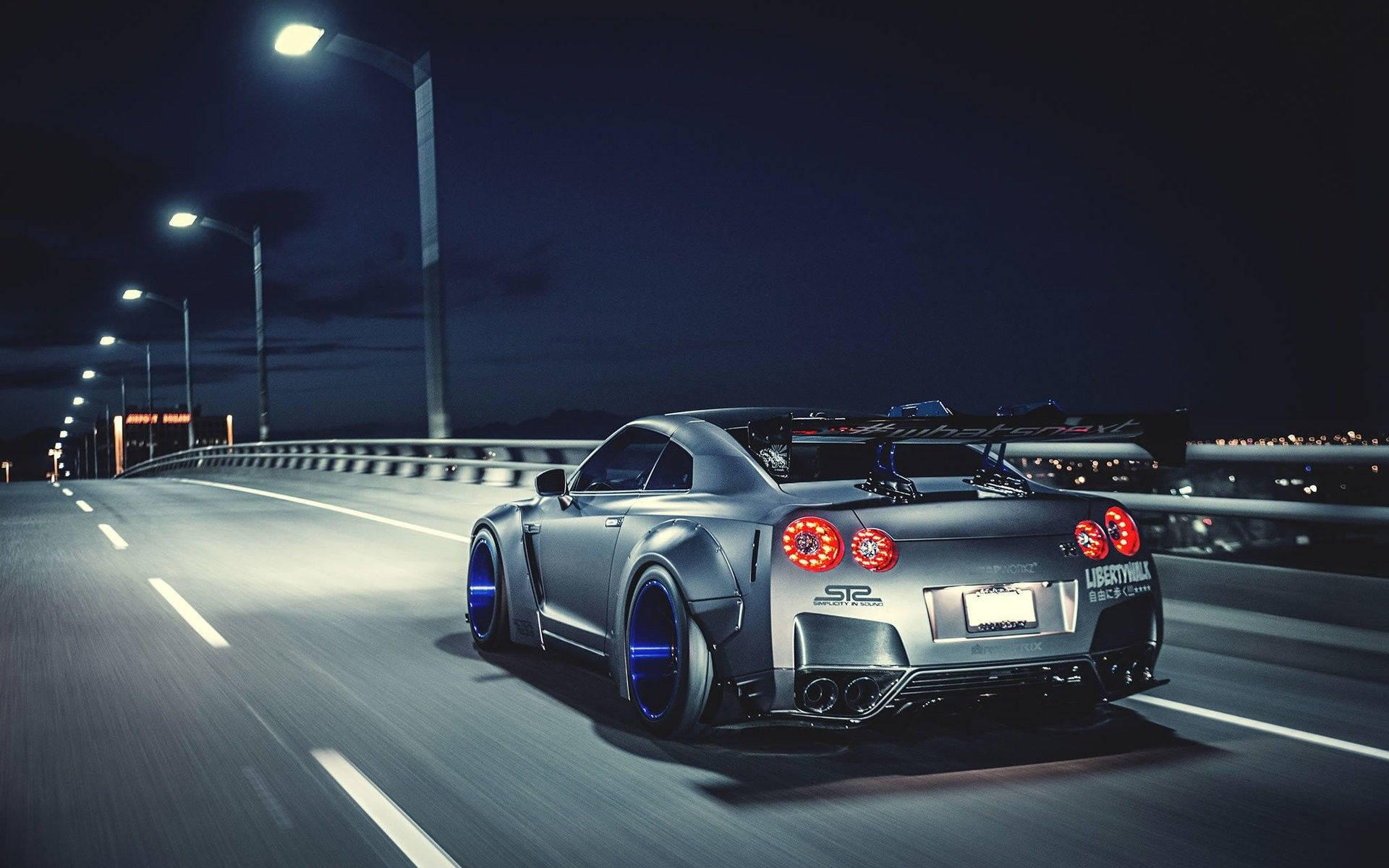 Moving Silver Nissan GTR Along The Road Wallpaper