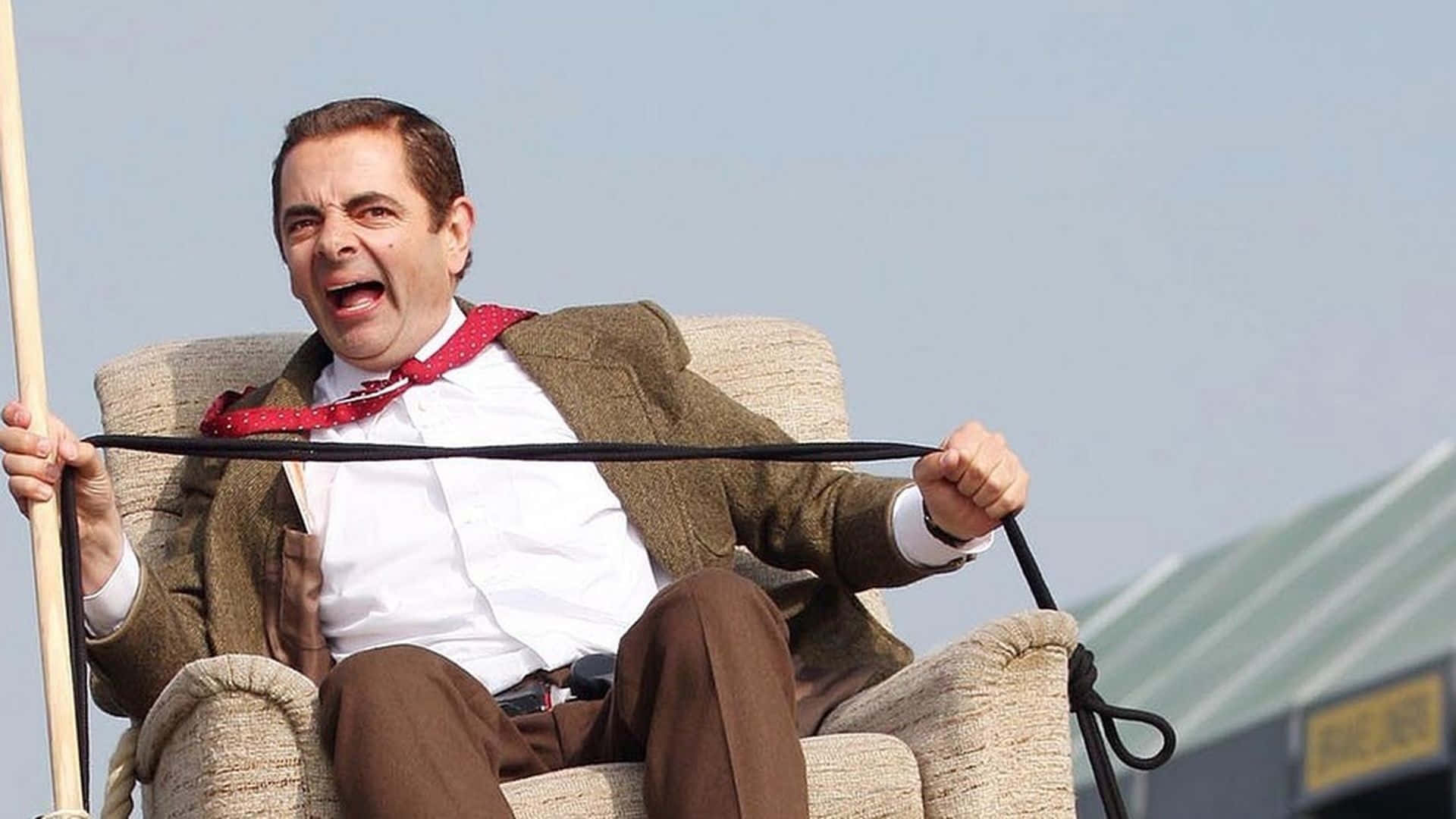 Caption: Mr. Bean's Hilarious High Jinks Caught in the Act