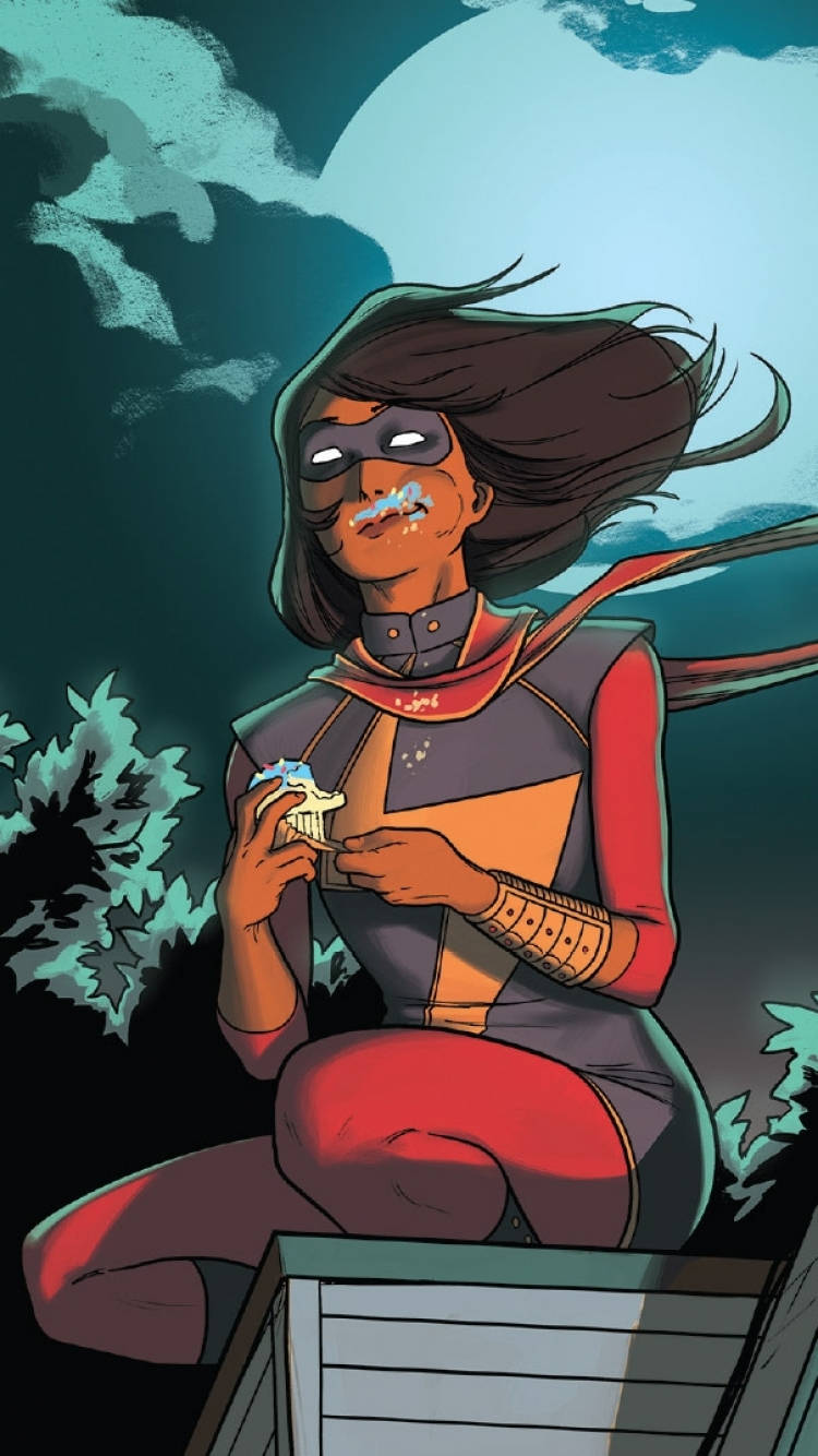 Ms Marvel Eating A Cupcake Wallpaper
