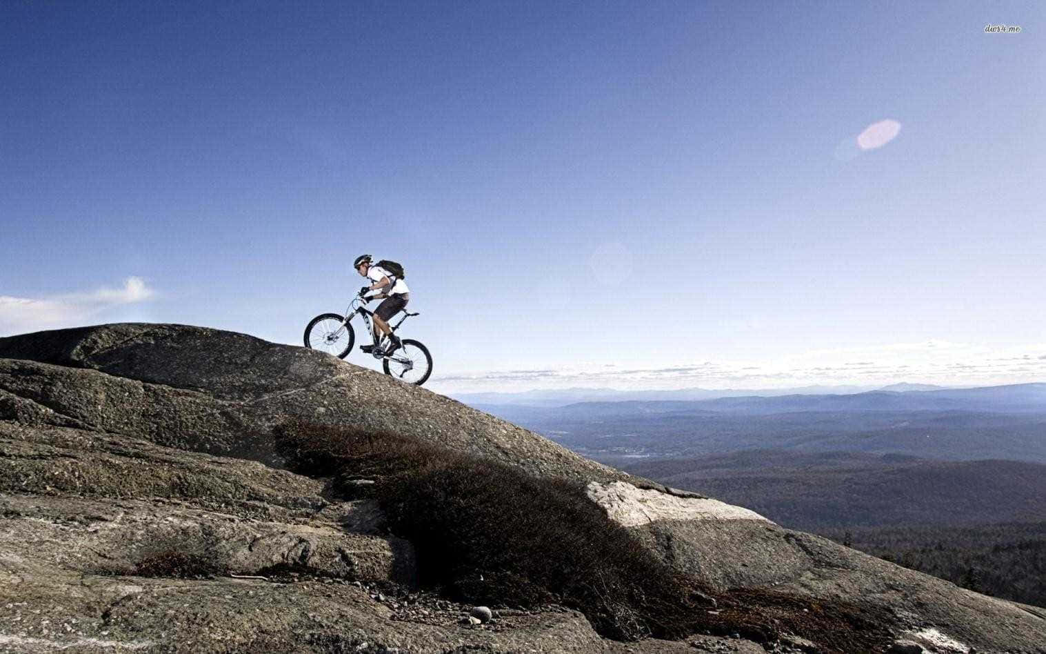 Mountain biker conquering rugged terrain
