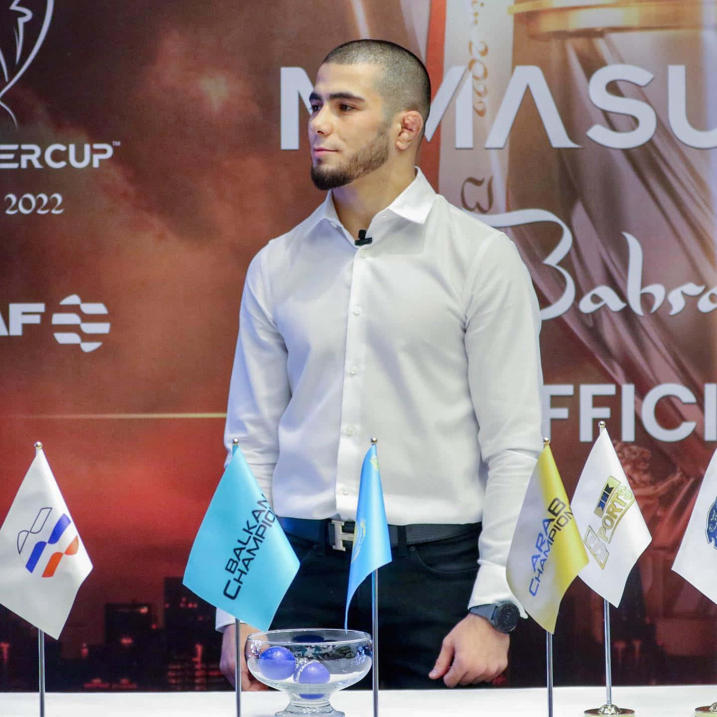 Dynamic Mixed Martial Artist Muhammad Mokaev Attending Press Conference Wallpaper