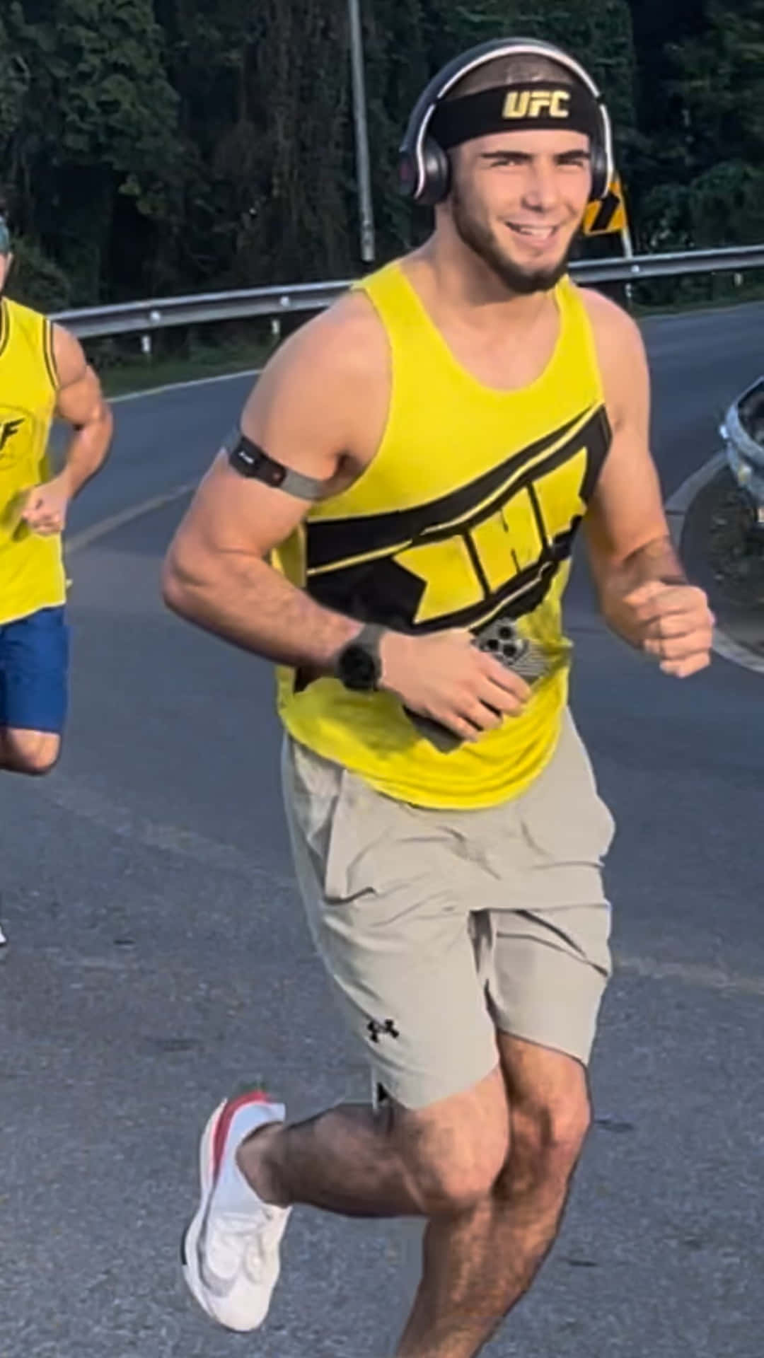 Muhammad Mokaev Jogging With Headphones Background