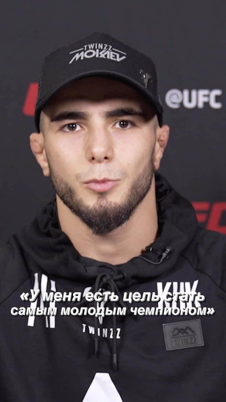 Mixed Martial Arts Fighter, Muhammad Mokaev, Speaking at a Conference Wallpaper