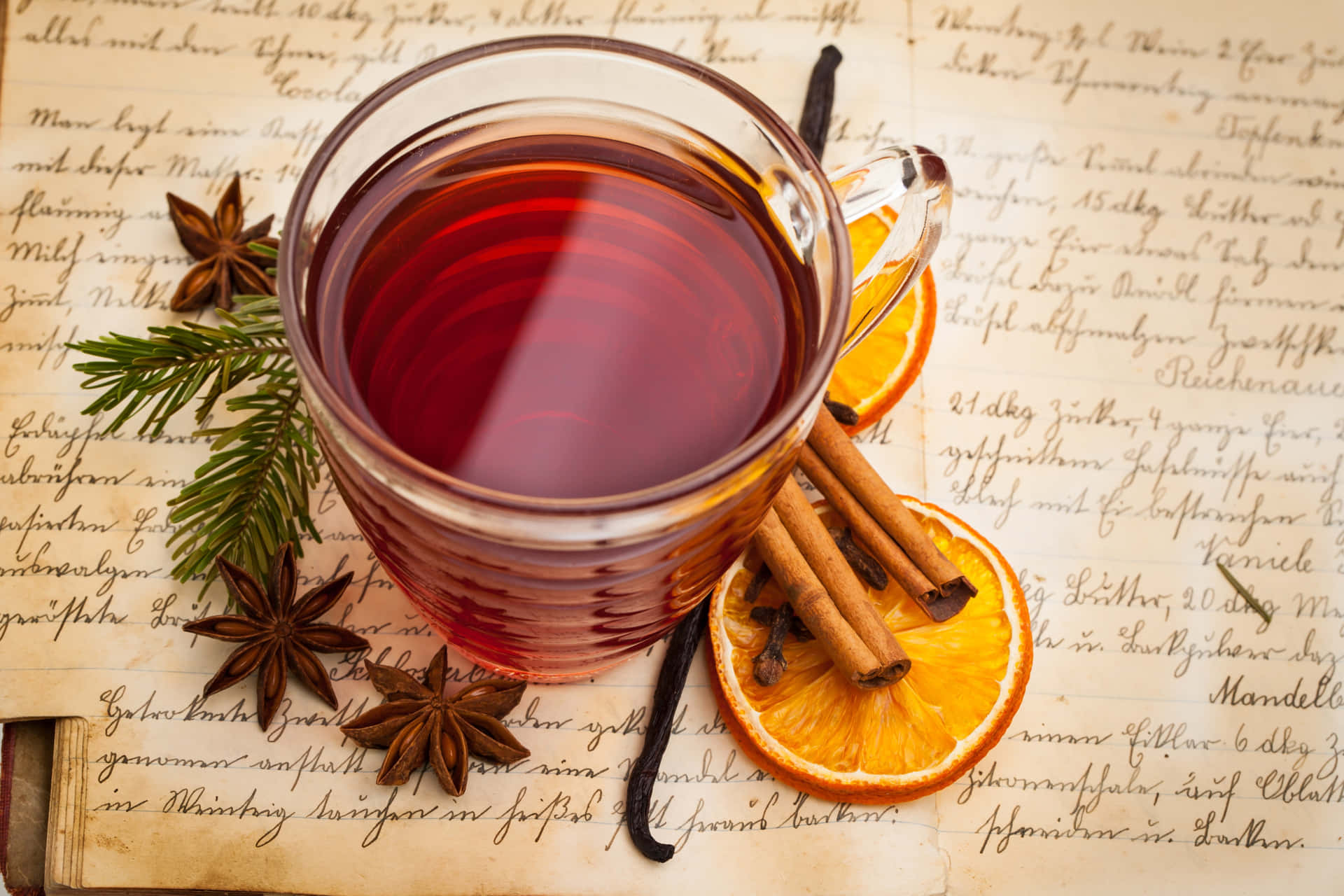 A Warm and Inviting Glass of Mulled Wine for the Holiday Season Wallpaper