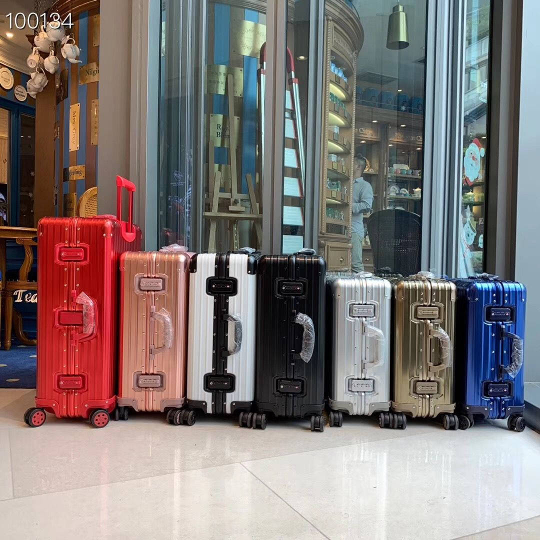 Multicolored Rimowa Suitcases Wallpaper