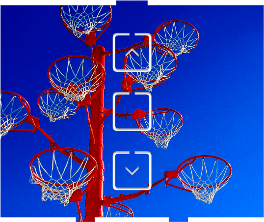 Download Multiple Basketball Hoops Against Blue Sky | Wallpapers.com