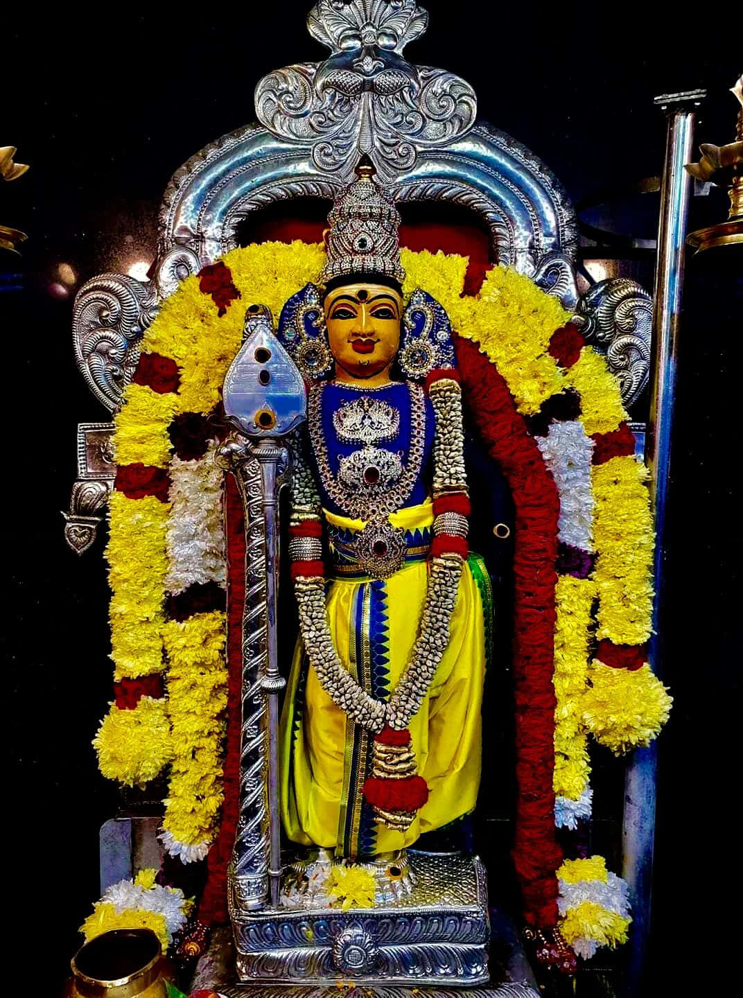 A devotee worships Lord Murugan