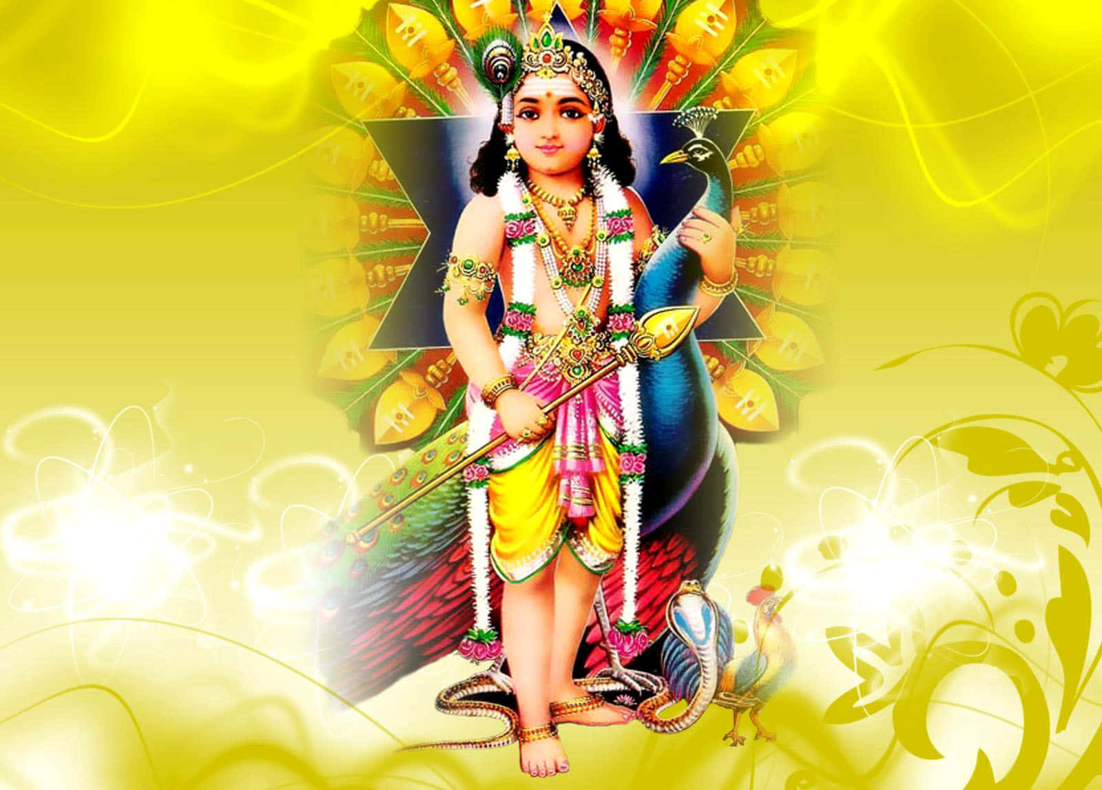 : Lord Murugan standing at the entrance of the temple
