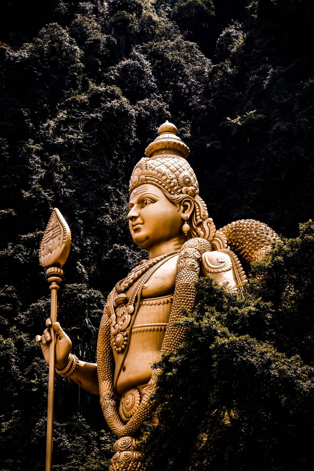 Download Murugan Statue With Trees Wallpaper | Wallpapers.com