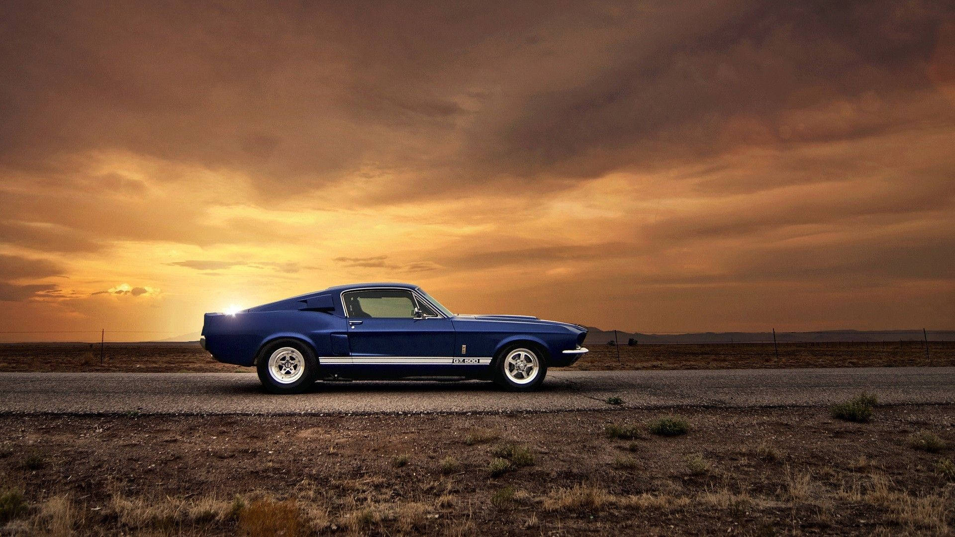 Muscle Car Driving During Sunset Wallpaper
