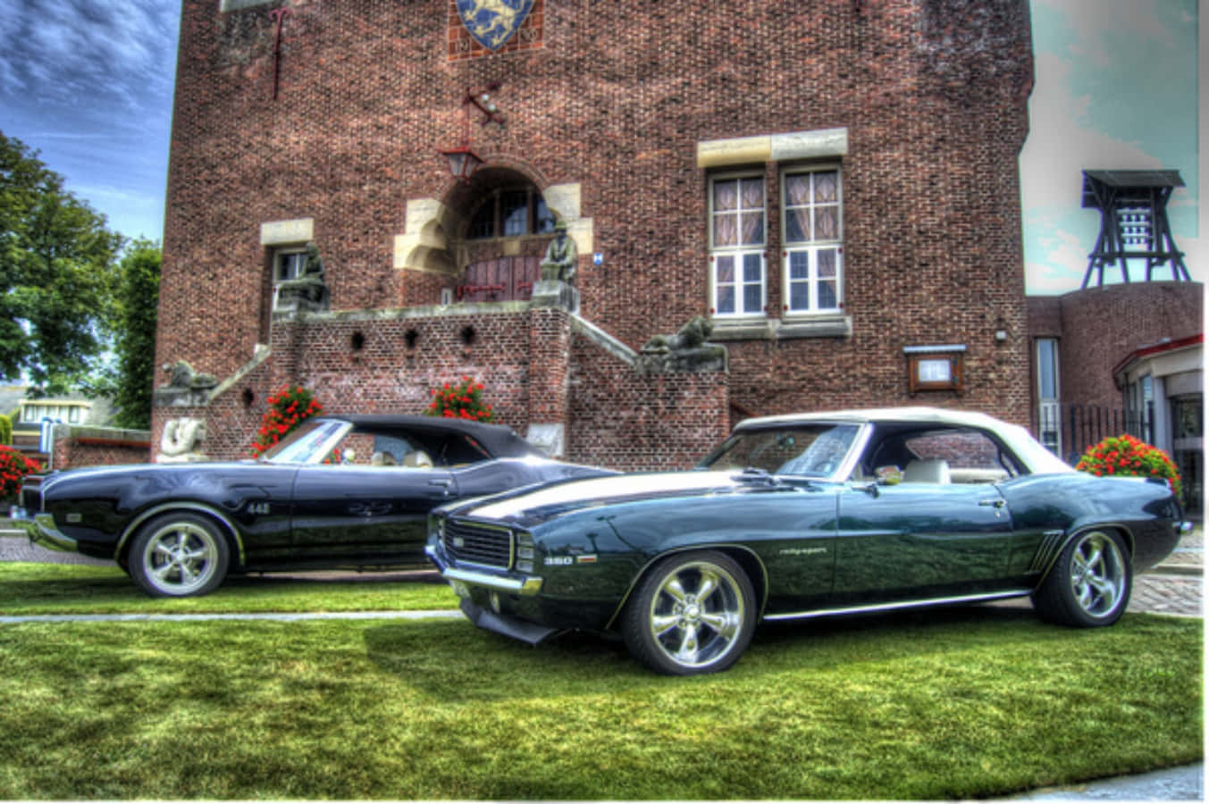 Two Cars Parked In Front Of A Brick Building