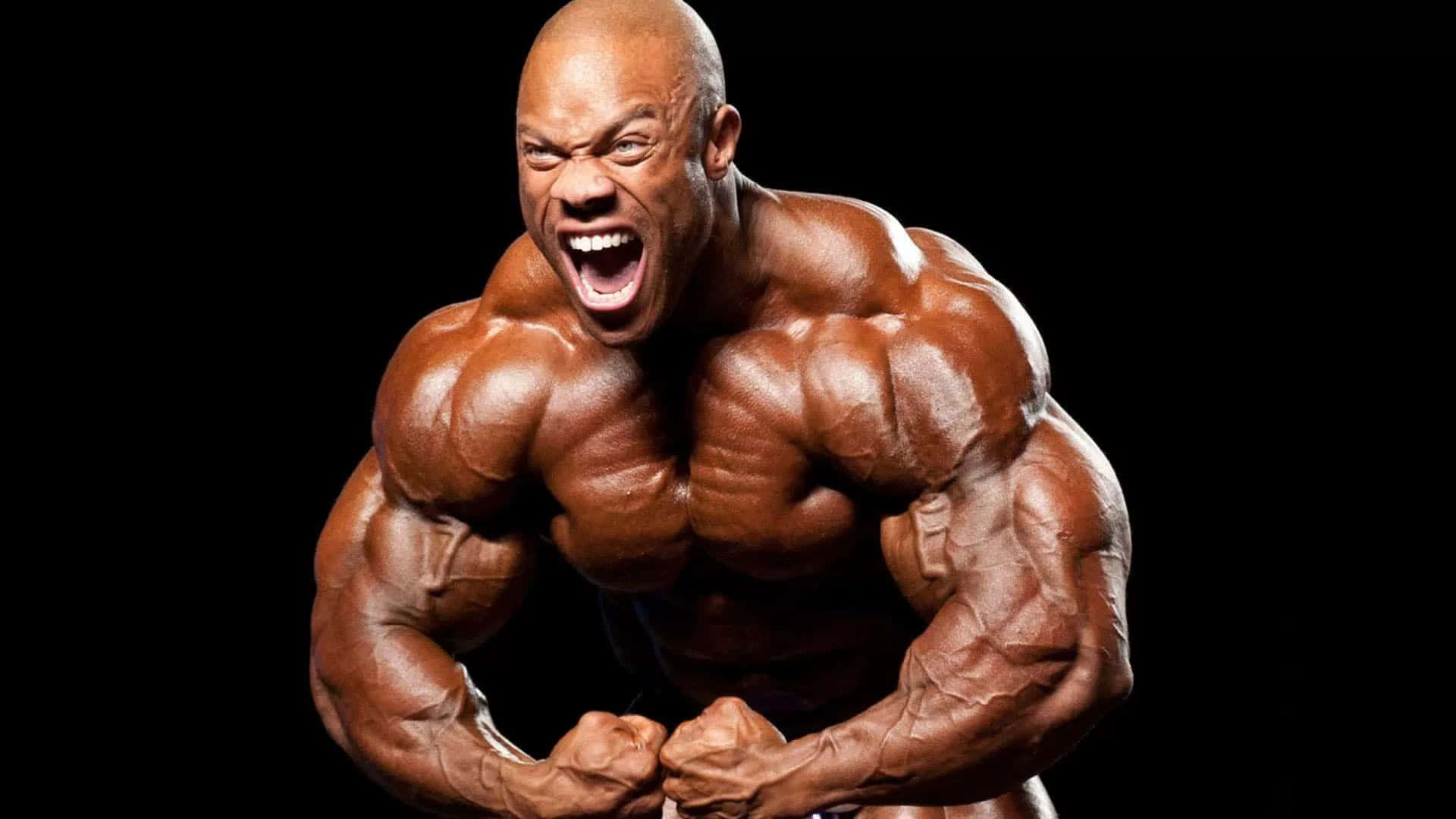 Download Muscular Bodybuilder Intensity Wallpaper | Wallpapers.com