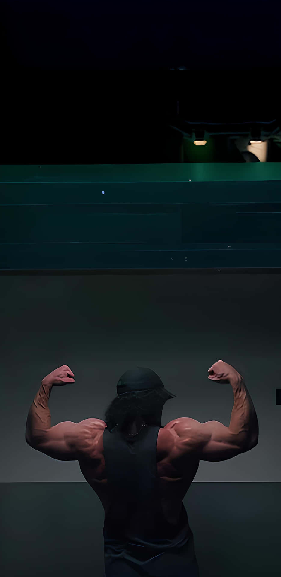 Muscular Man Flexing Bicepsat Night Wallpaper