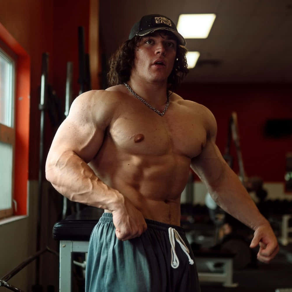 Muscular Man Gym Workout Wallpaper