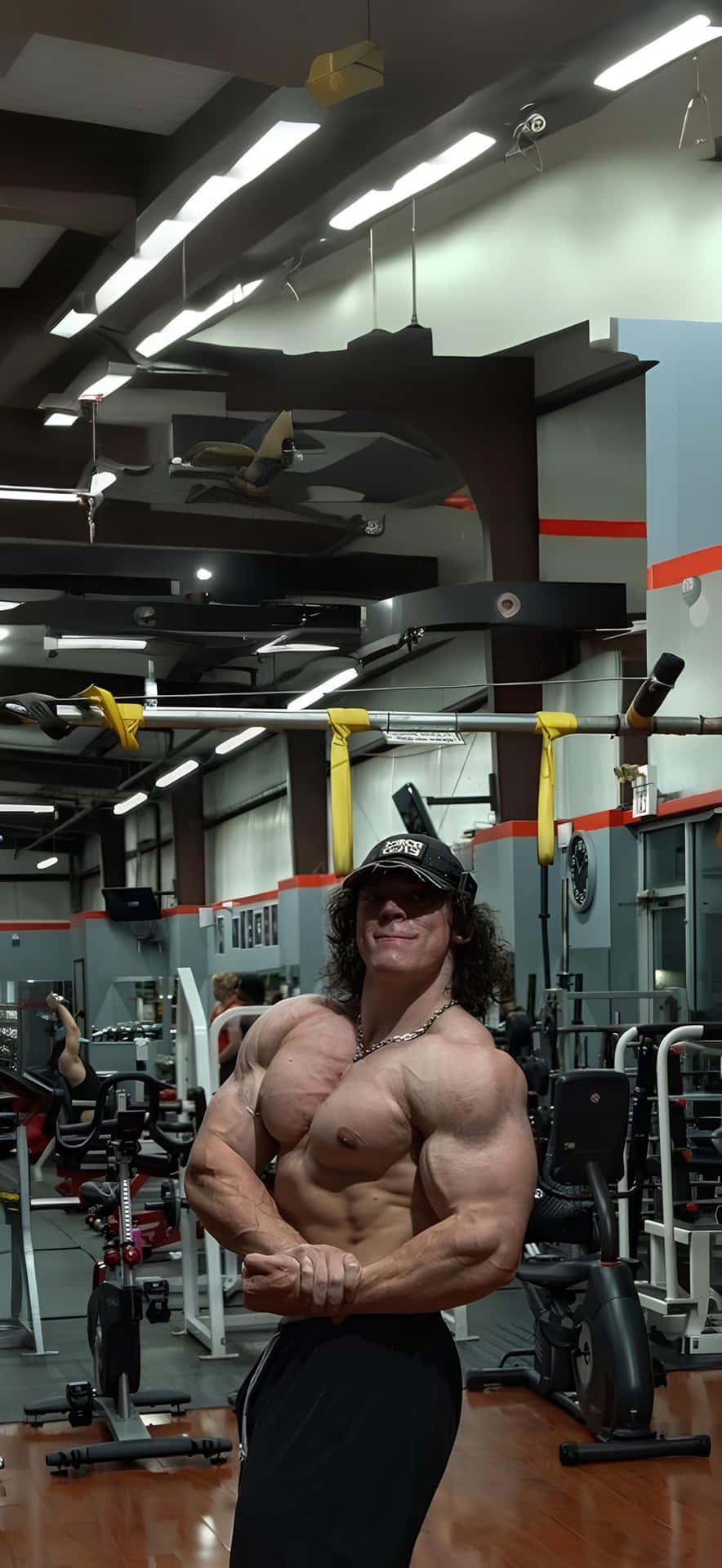 Muscular Man Posingin Gym.jpg Wallpaper