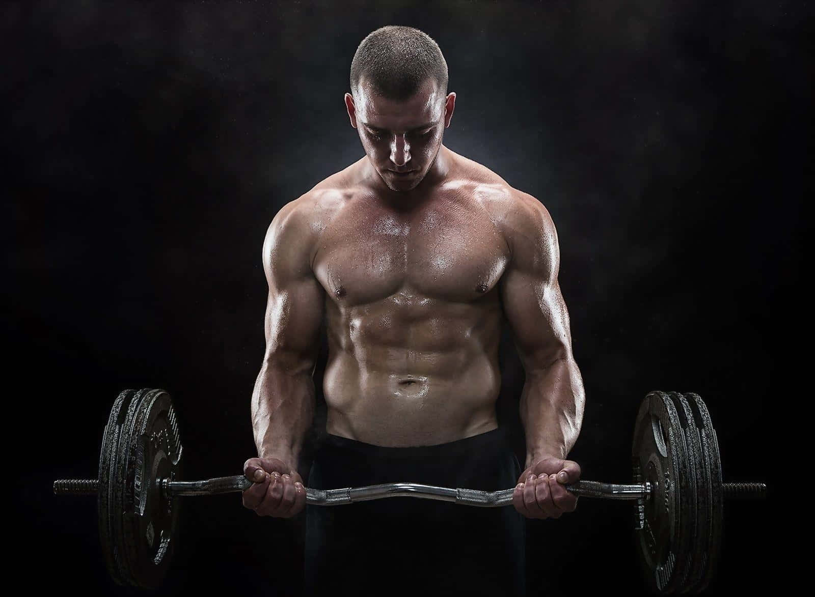 Spierachtige Man Bereidt Zich Voor Op Deadlift Achtergrond