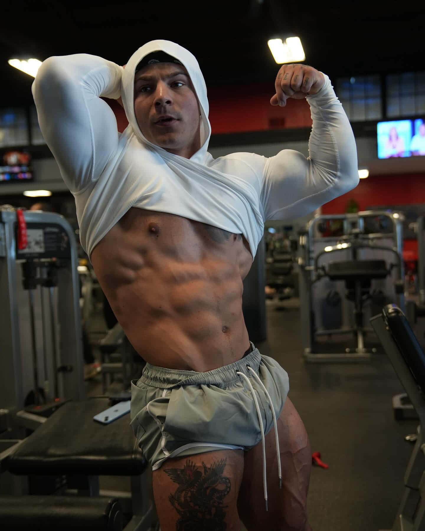 Muscular Man Showing Absat Gym Wallpaper