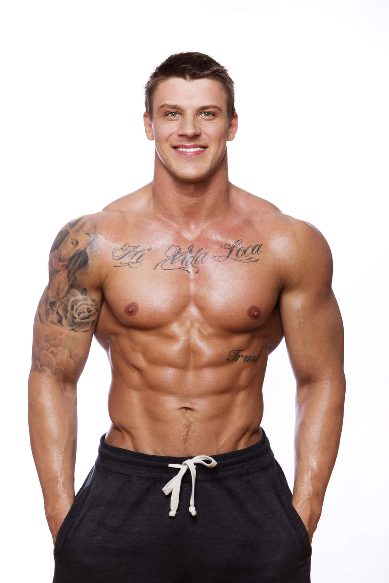 Muscular Manwith Tattoos Wallpaper