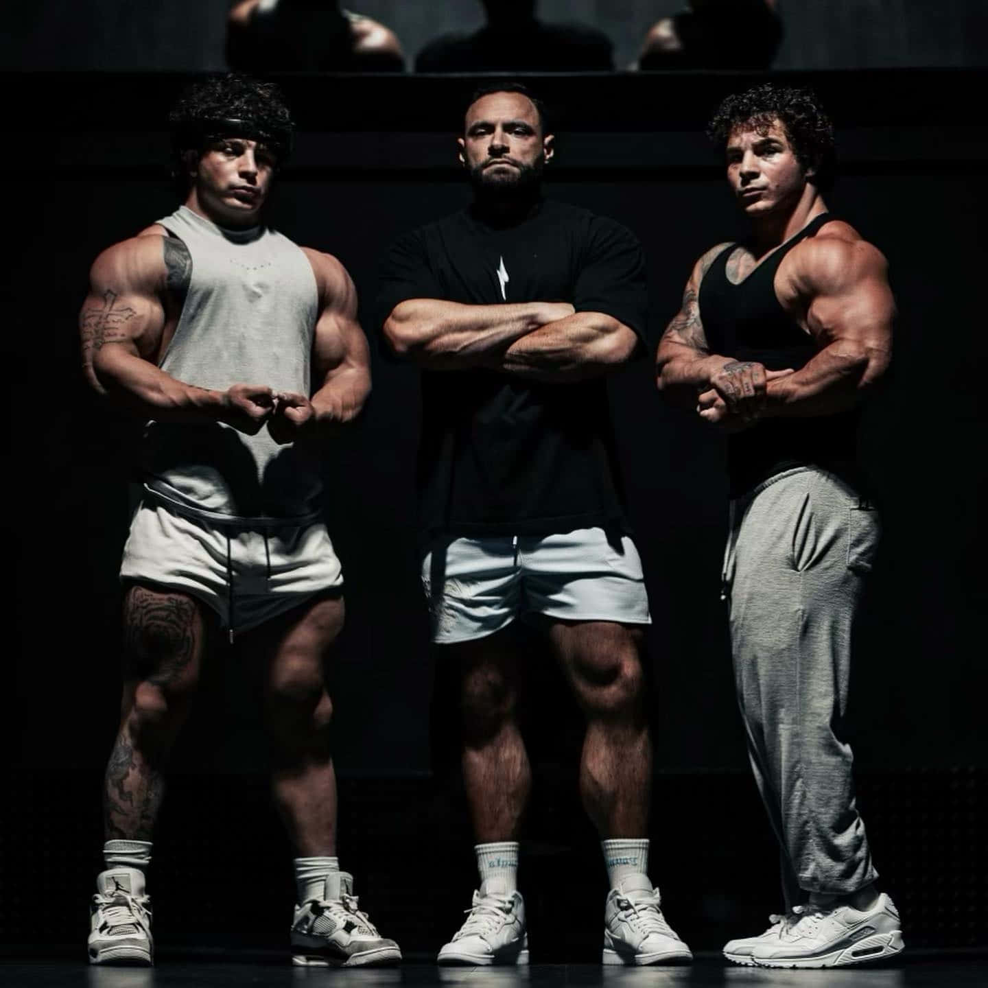 Muscular_ Trio_ Show_of_ Strength.jpg Wallpaper