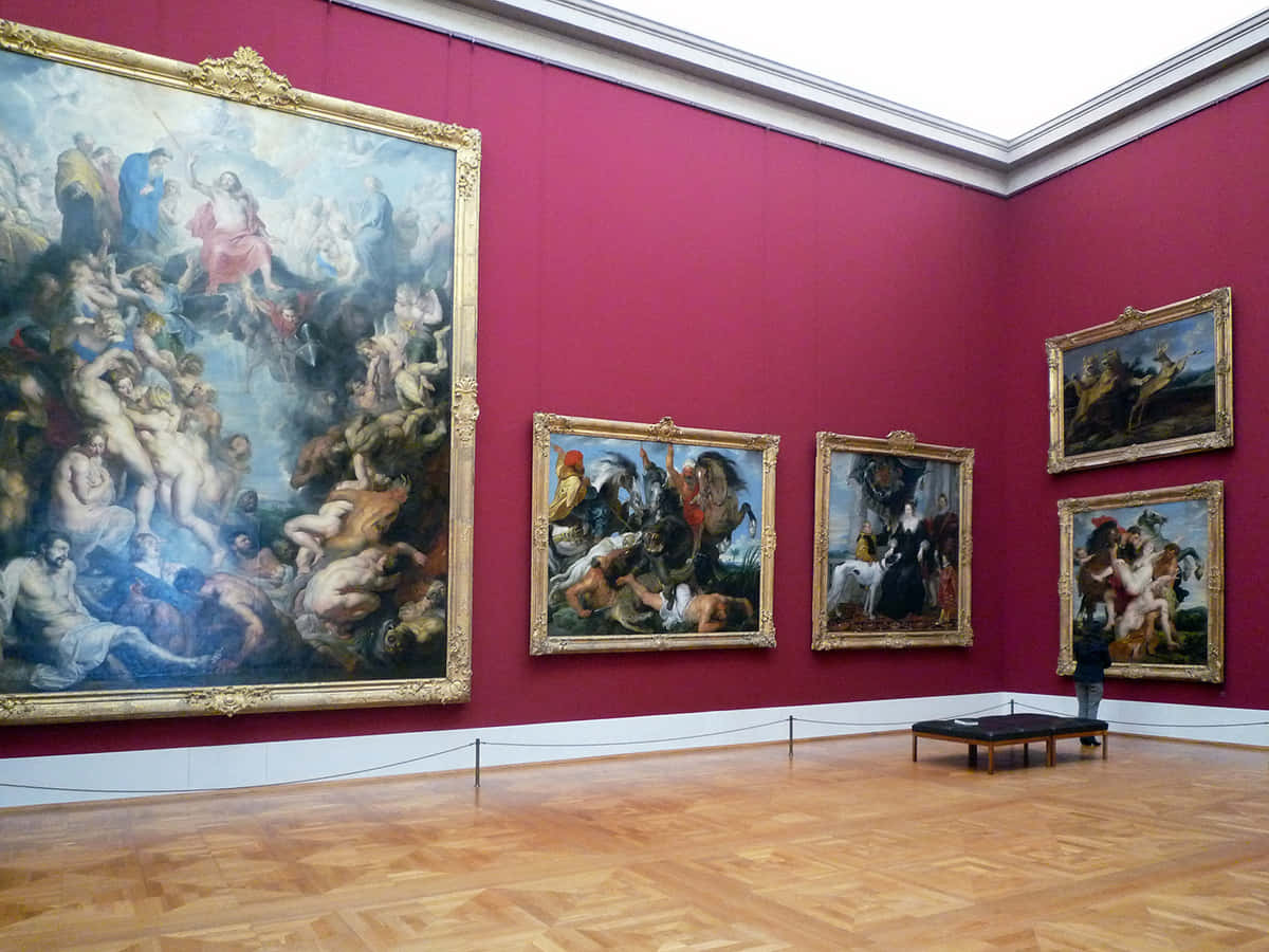 A Room With Paintings On The Walls