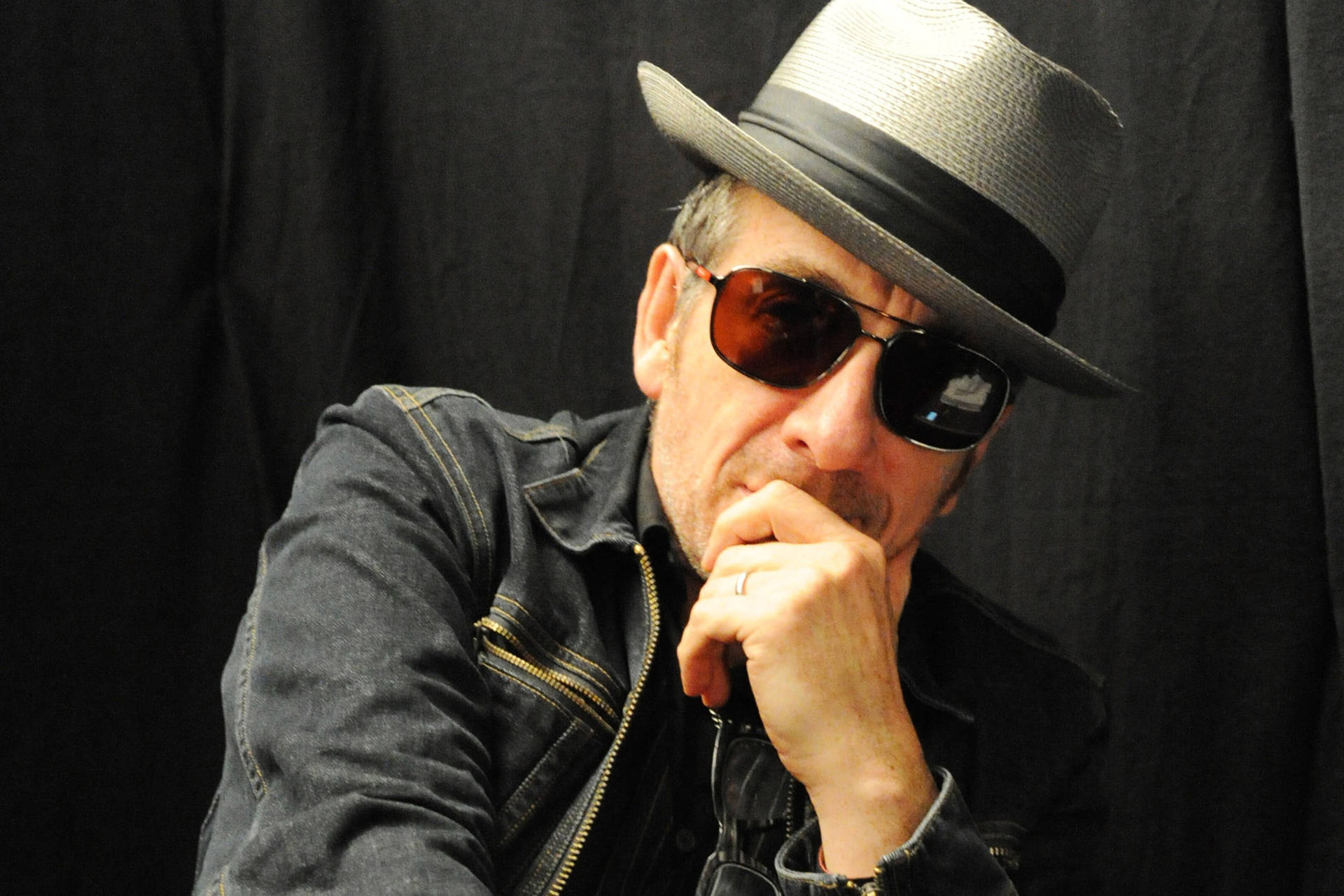Music Icon Elvis Costello Looking Cool Wallpaper