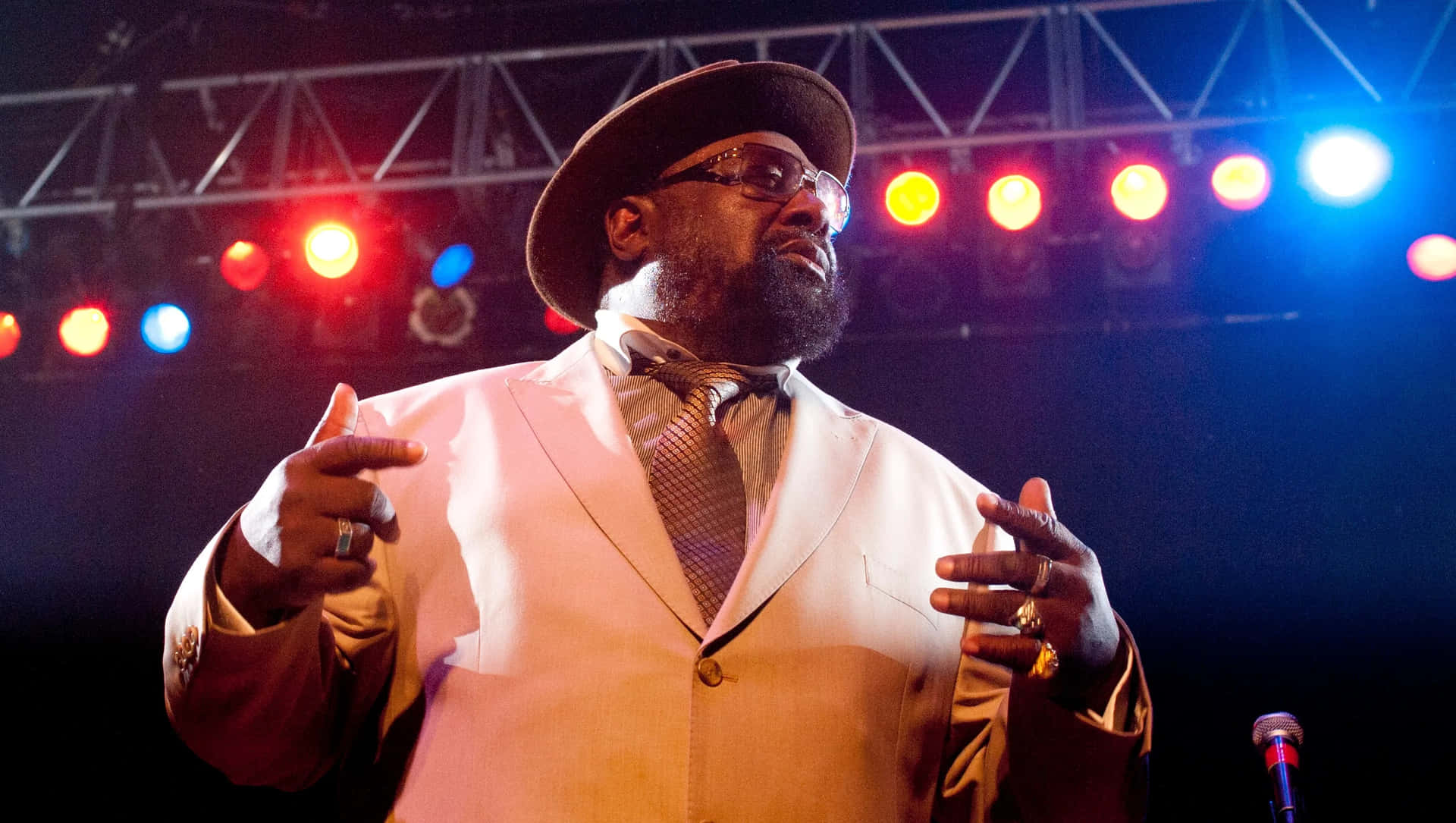Music Legend George Clinton in Action Wallpaper