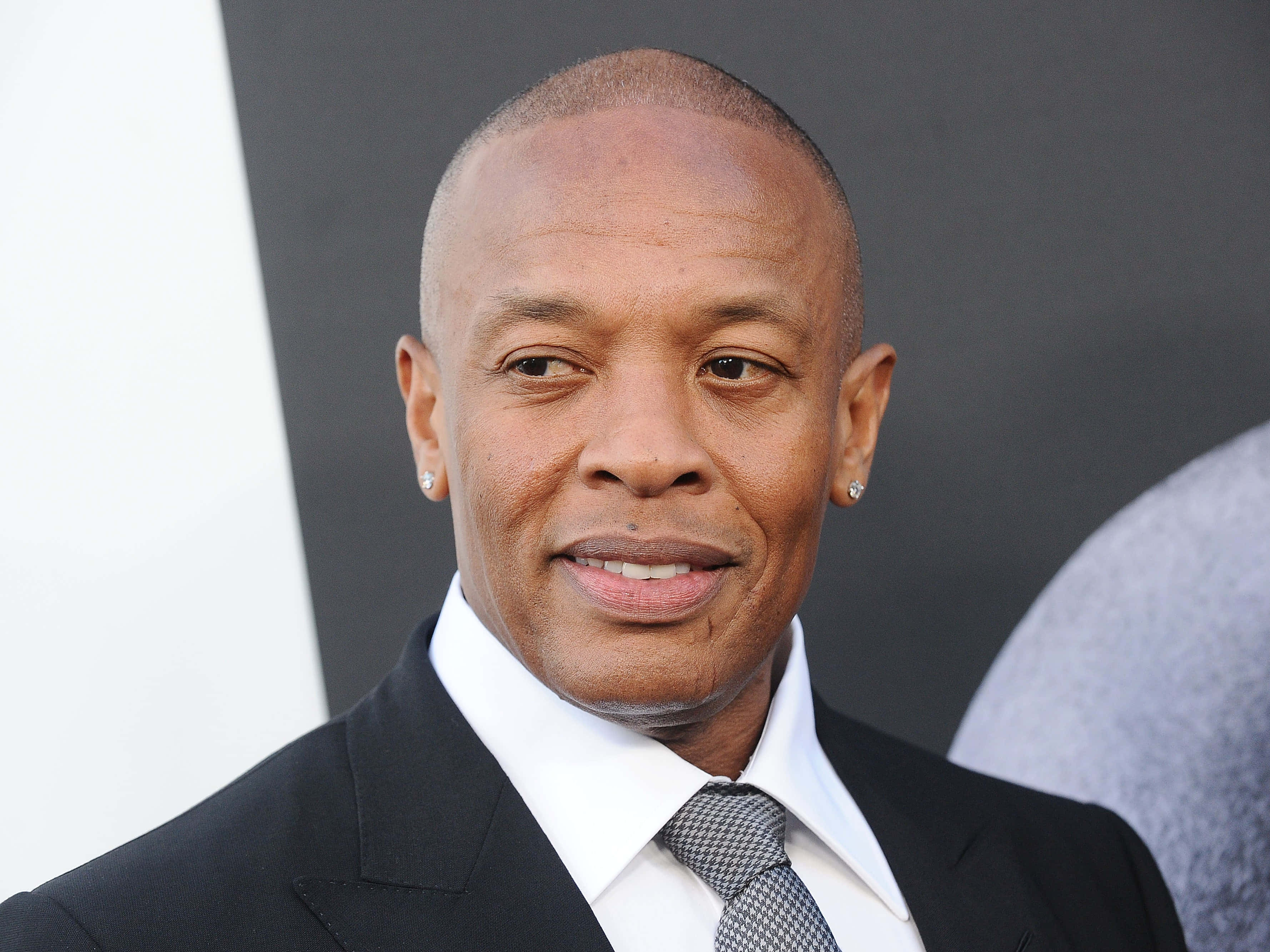 Music Legend, Dr. Dre, Working On Beats In His Studio Wallpaper