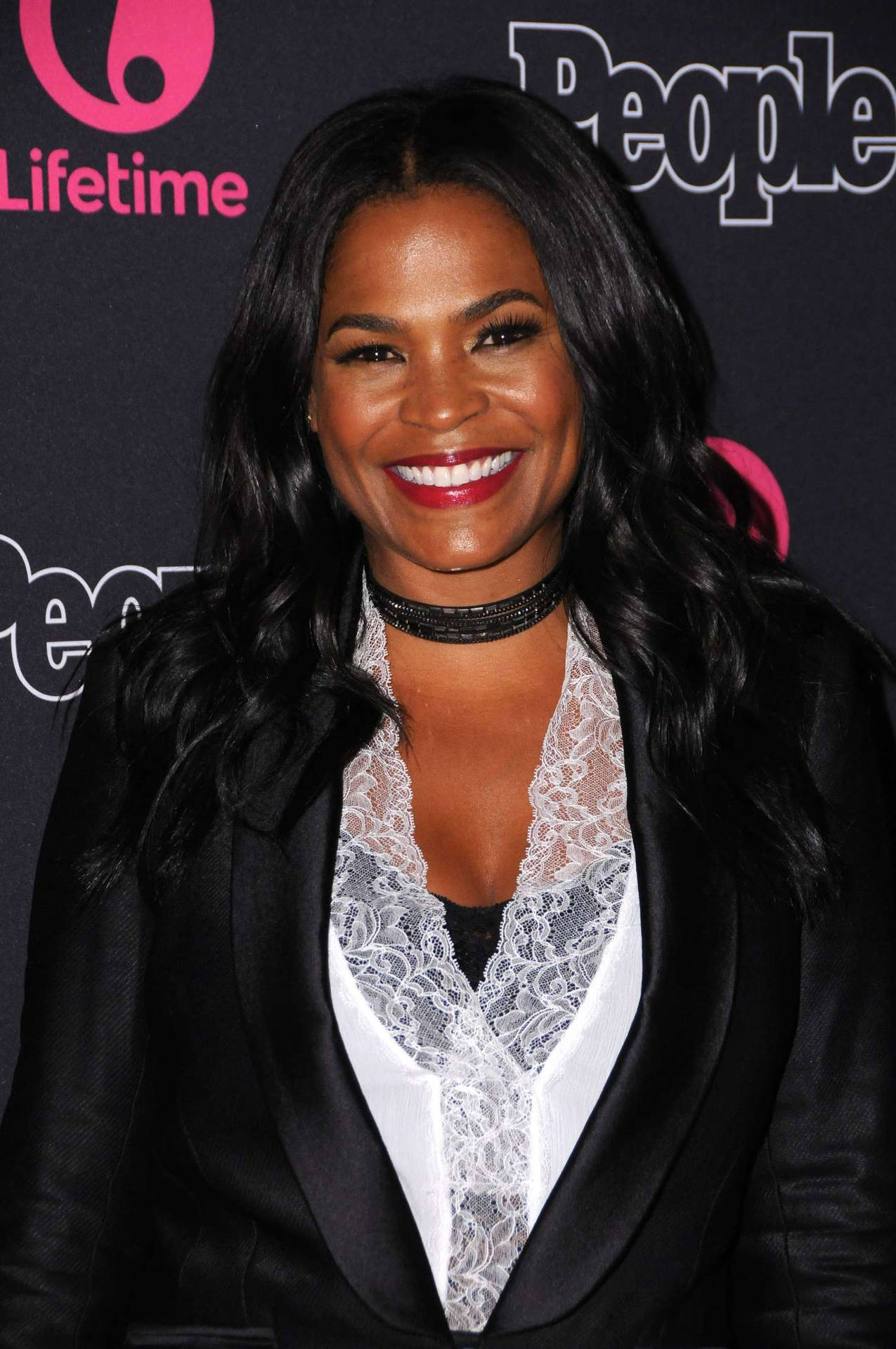 Accomplished Actress and Director Nia Long in Action Wallpaper