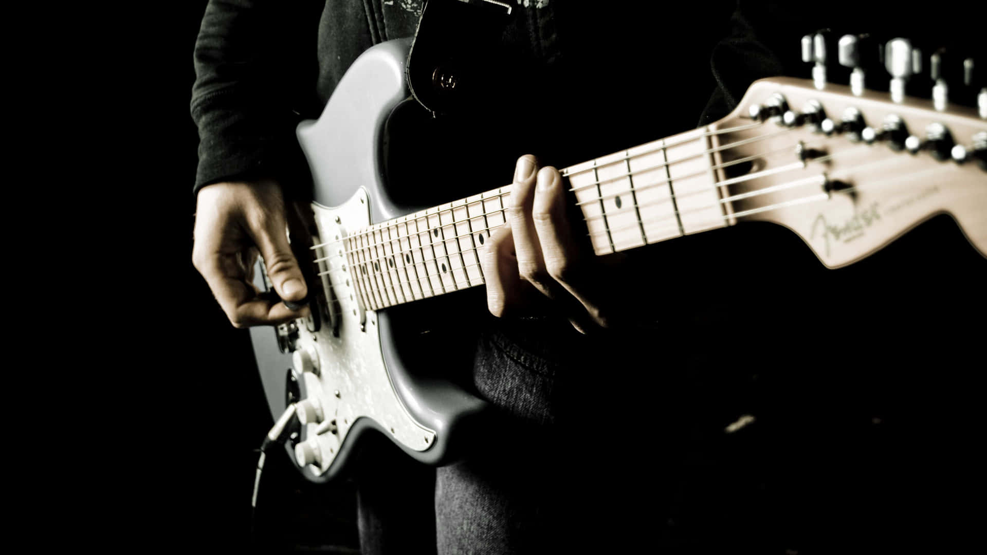 Personsom Håller En Musikinstrument-gitarr-bild