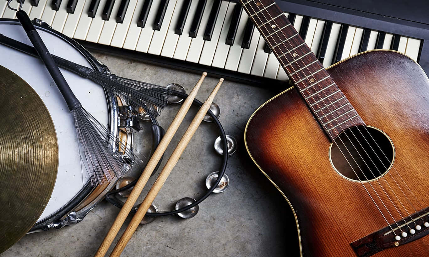Musical Instruments Guitar And Drumsticks Picture