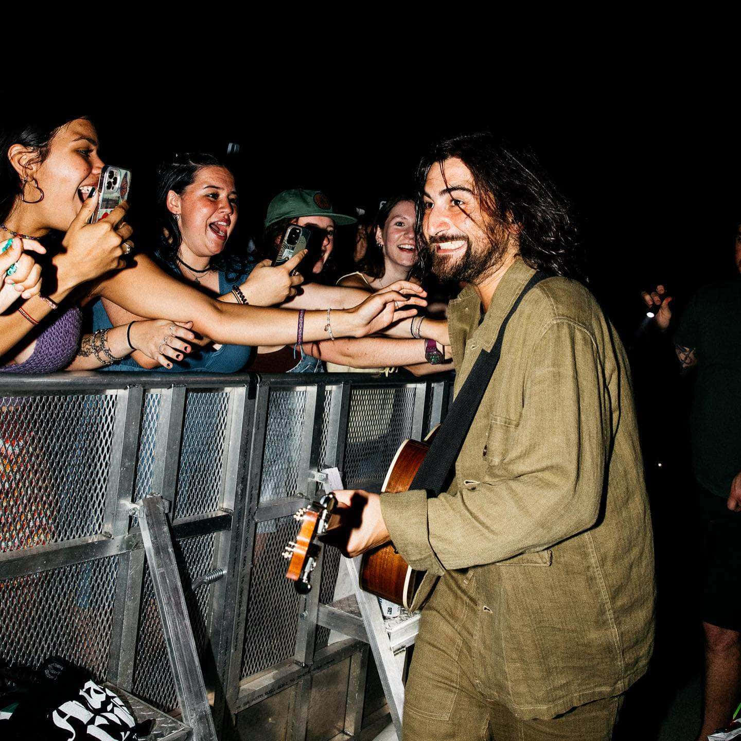 Musician Greeting Fans At Concert Wallpaper