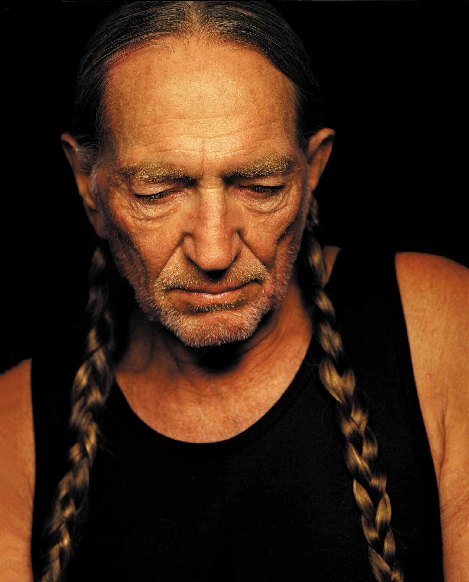 Musician Willie Nelson With Braided Hair Wallpaper