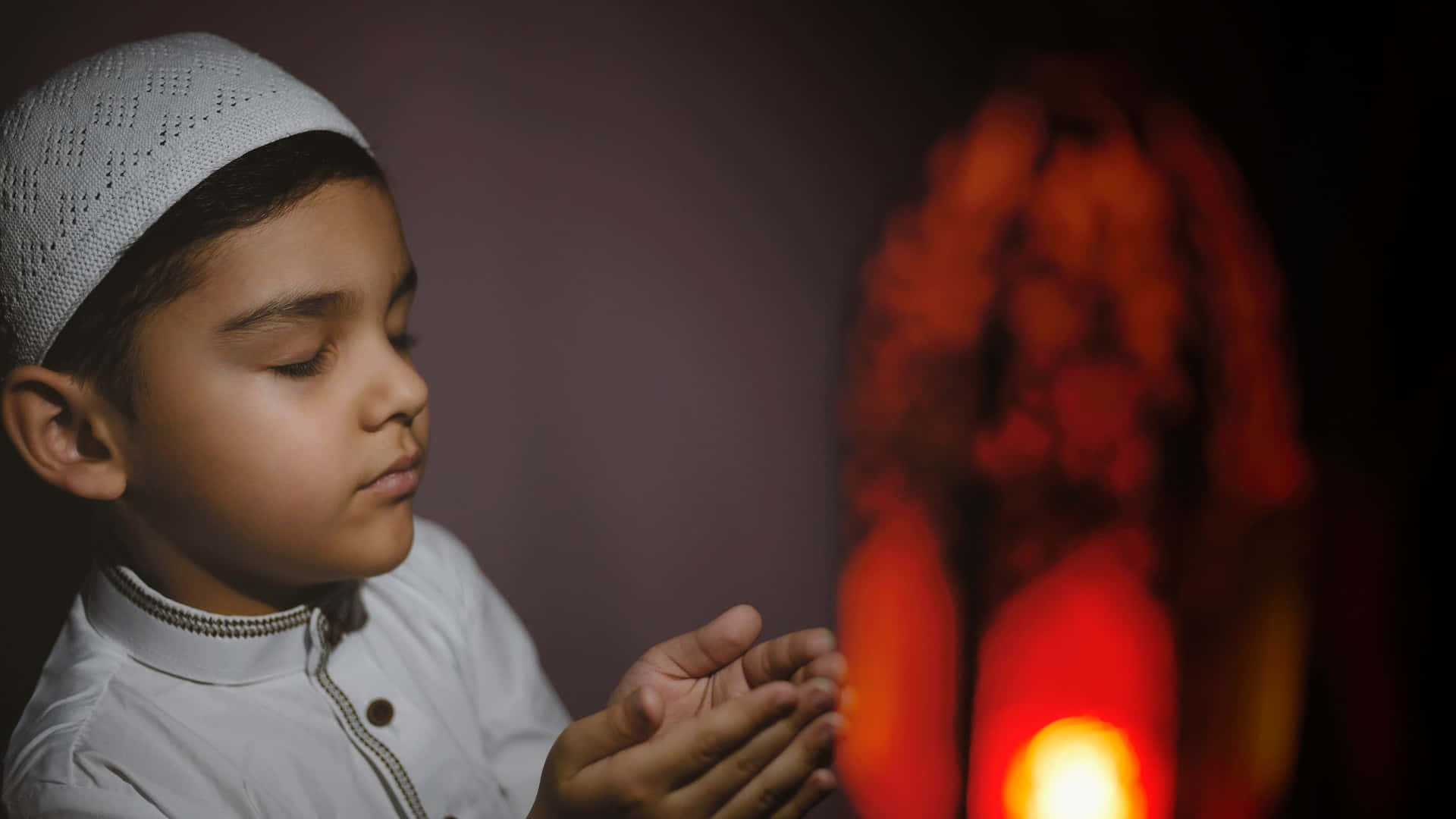 Muslim Boy Sincerely Praying Wallpaper