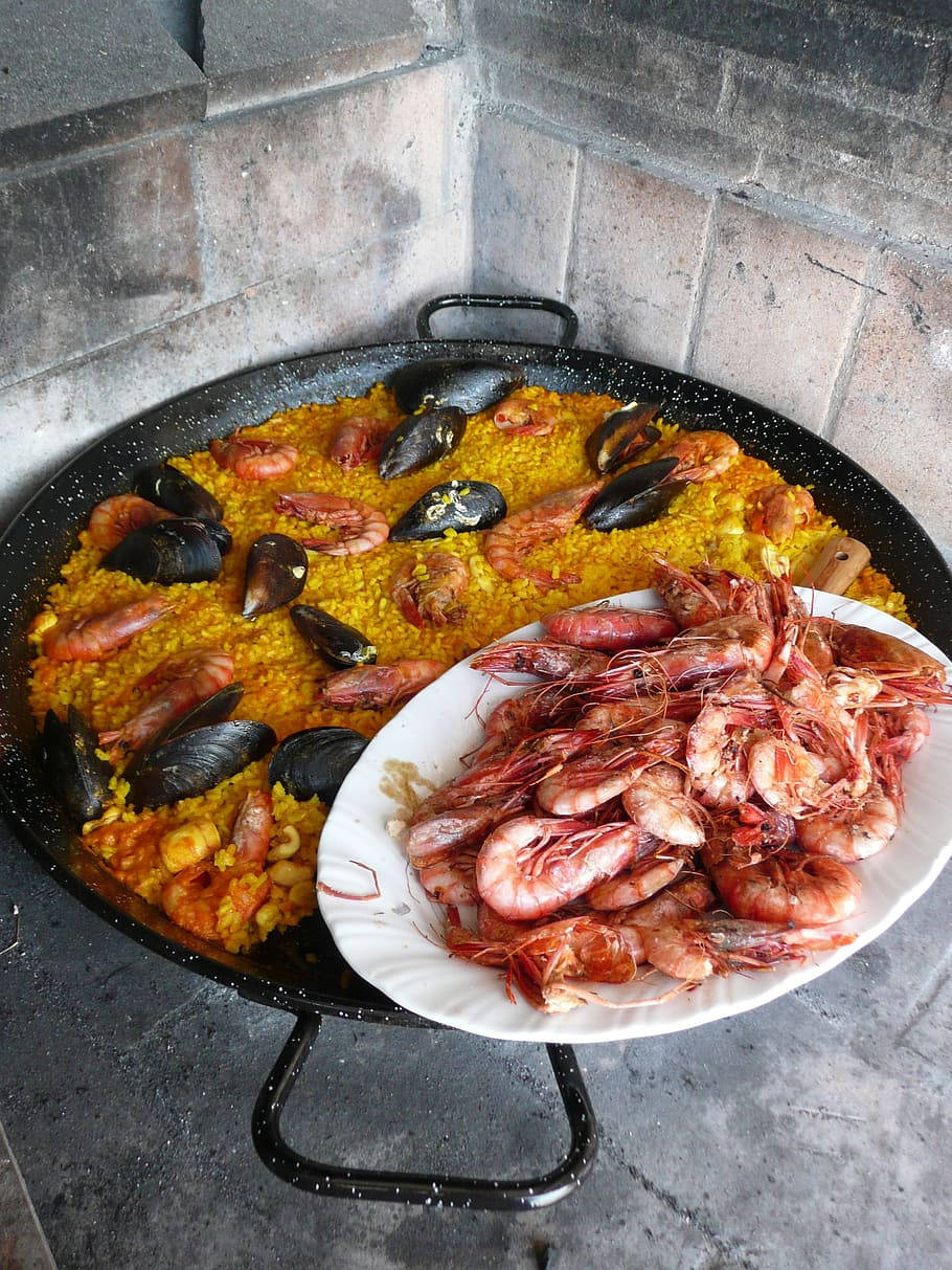 Mussel Paella With A Plate Of Prawns Wallpaper