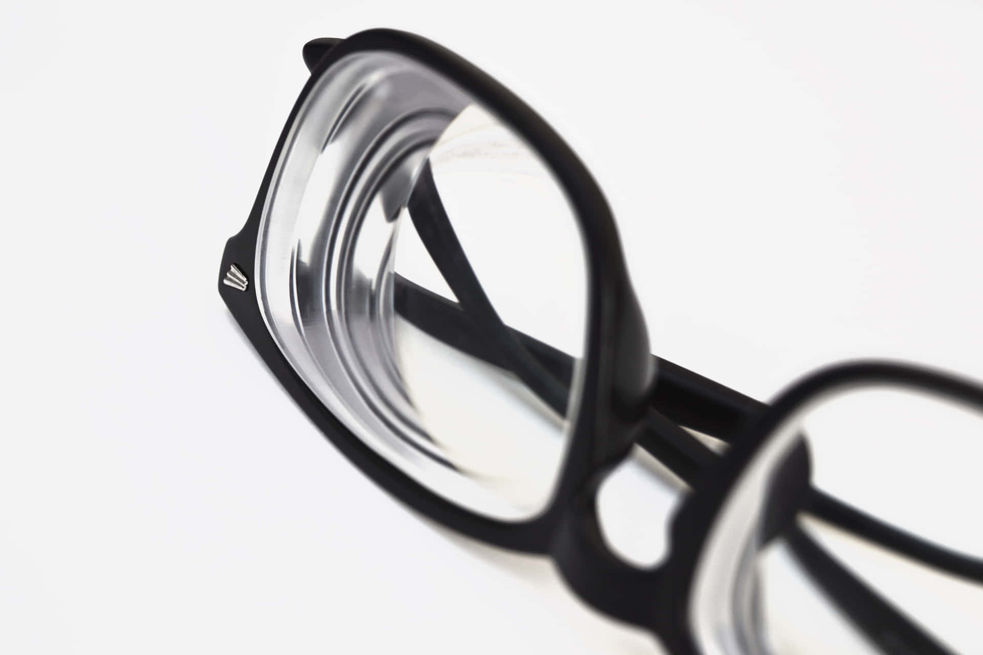 Myopic Eyeglasses With Thick Lenses Wallpaper