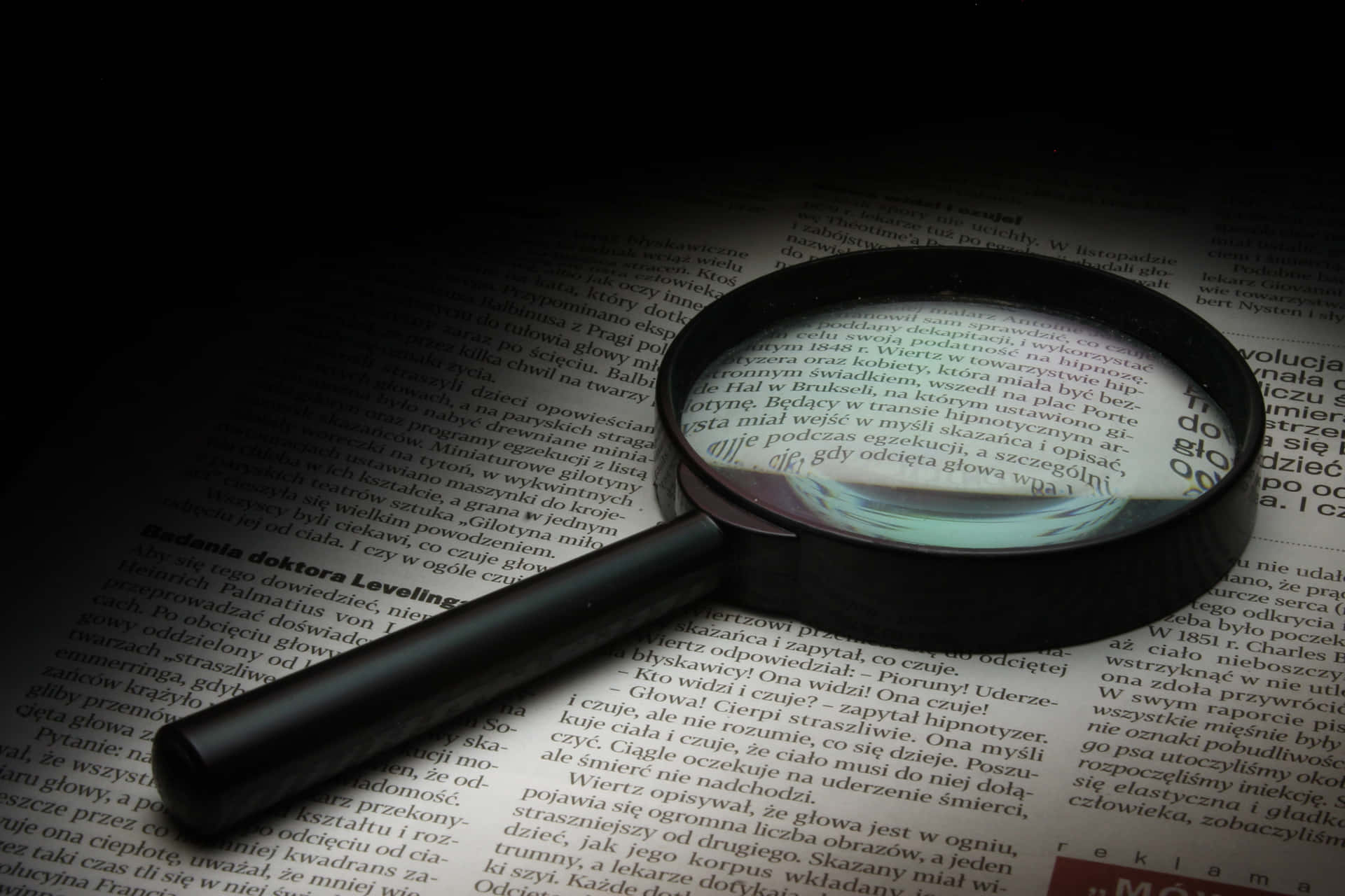 Uncovering Secrets with a Magnifying Glass Wallpaper