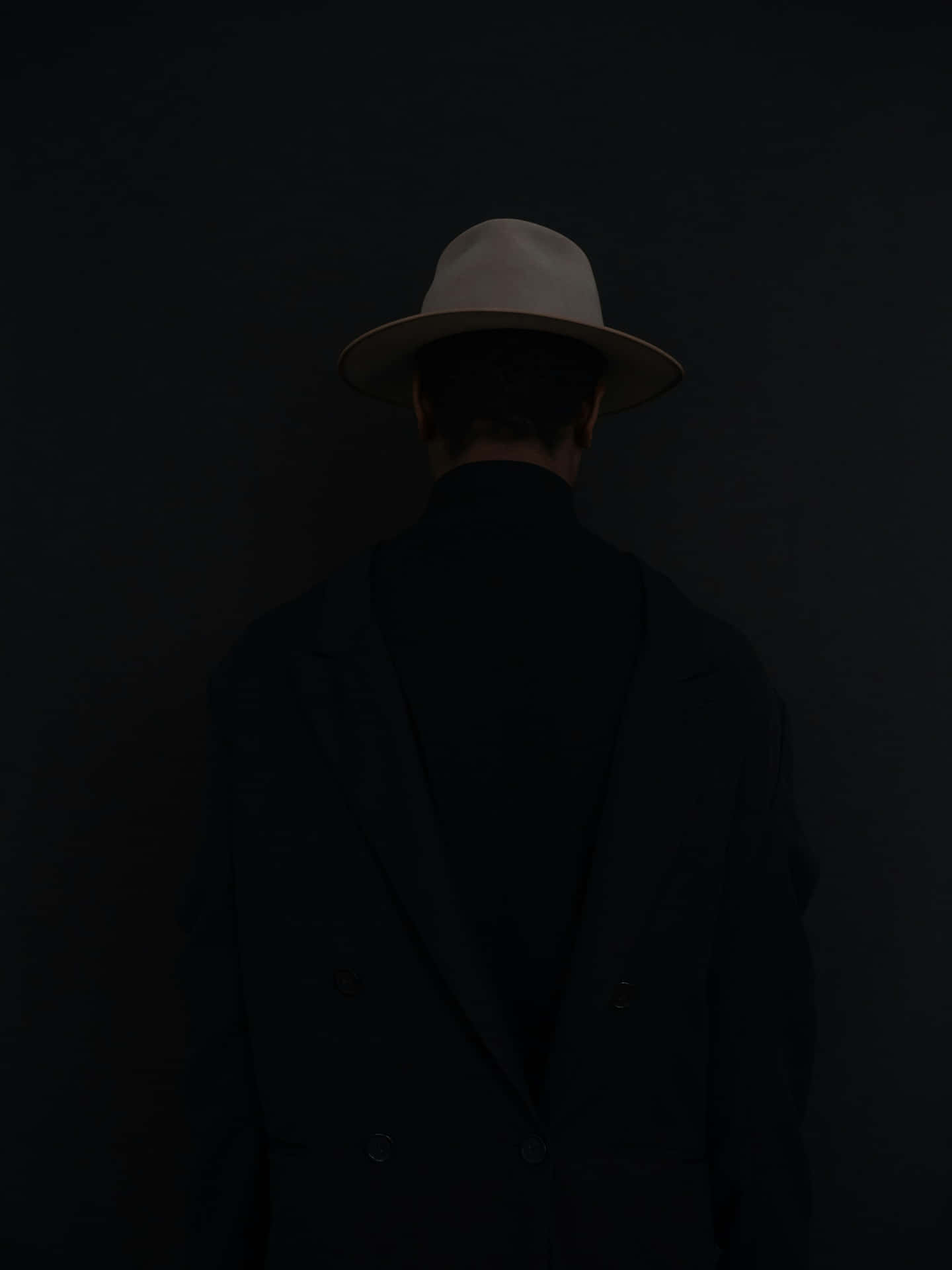 Mysterious_ Man_in_ Hat_and_ Coat Wallpaper