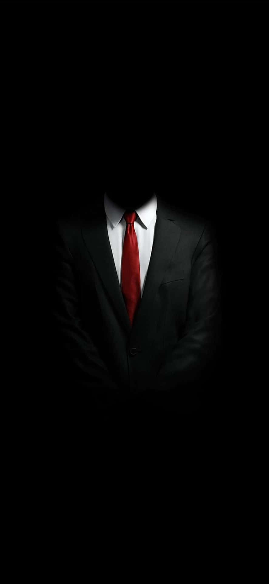 Mysterious Manin Suitand Red Tie Wallpaper