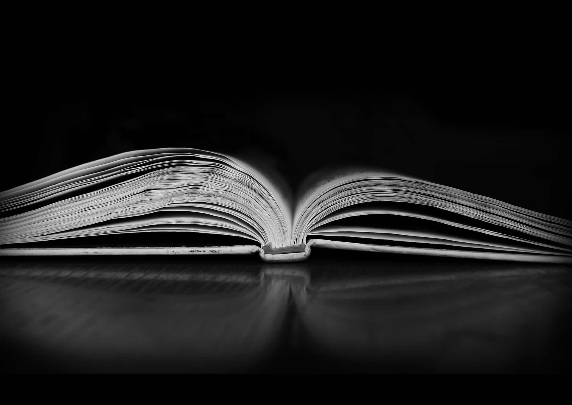 Mysterious_ Open_ Book_ Black_and_ White Wallpaper