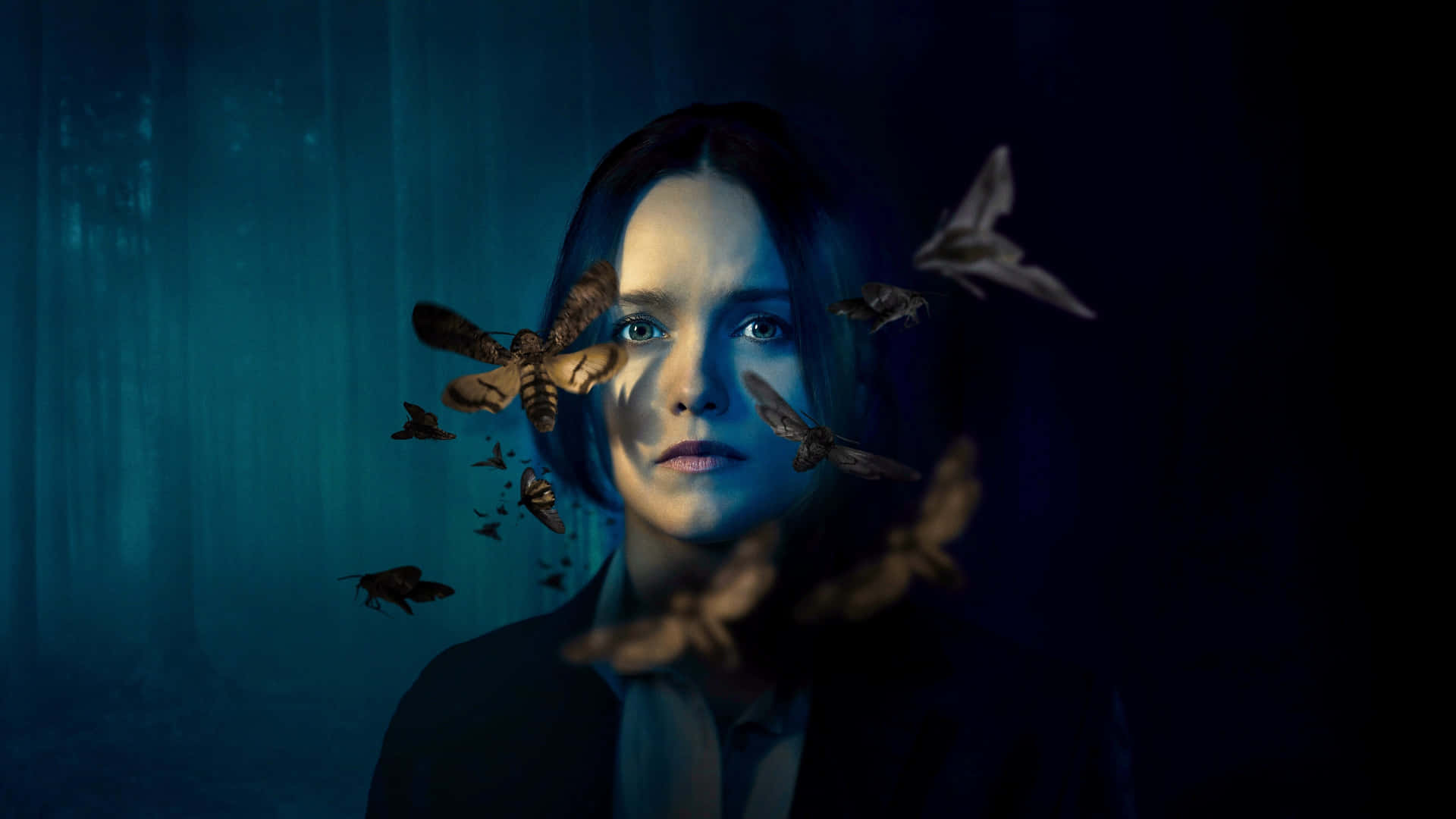 Mysterious Womanwith Moths Wallpaper