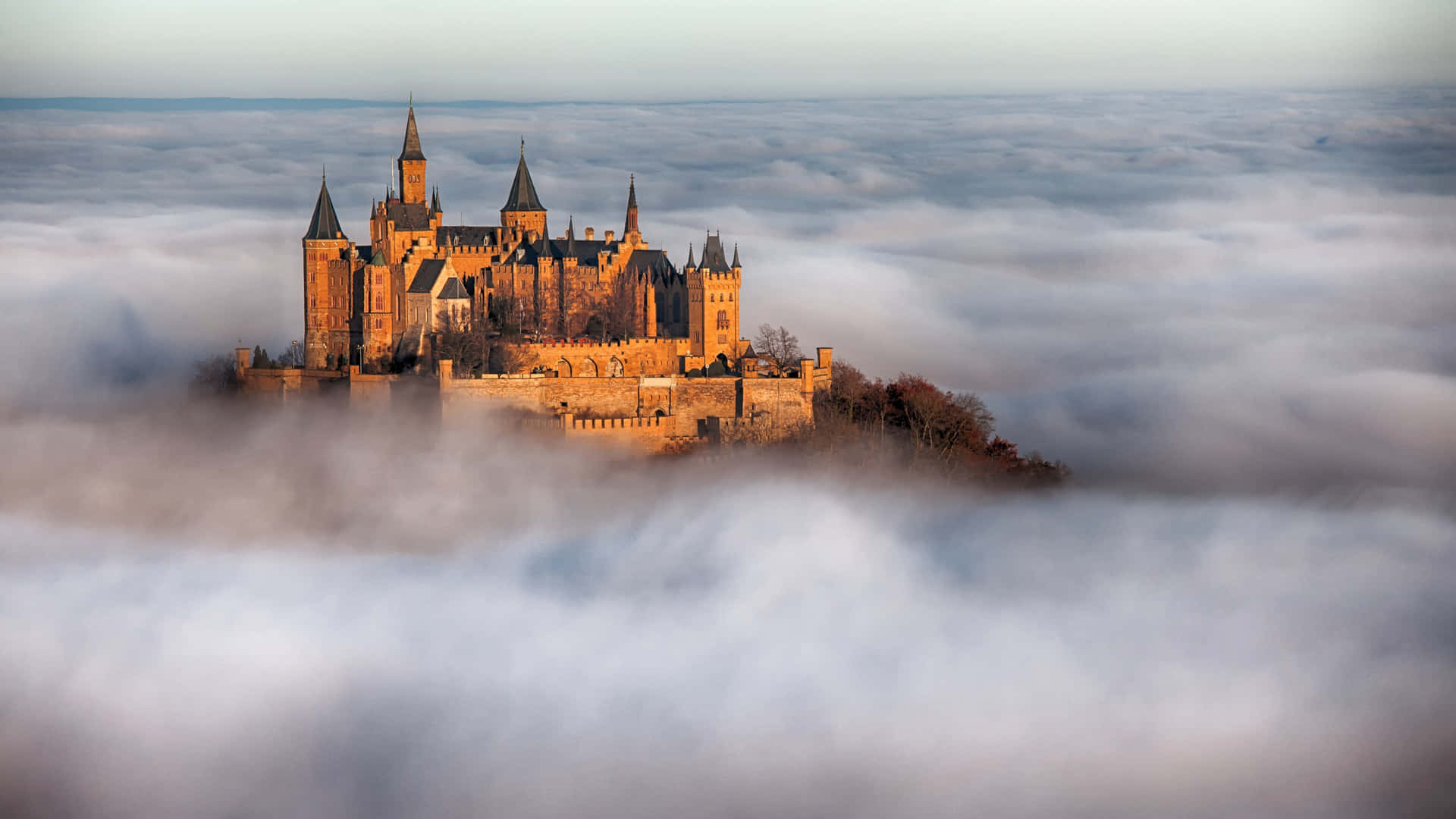 Mystical_ Castle_ Above_ Clouds Wallpaper